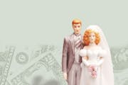 200 dpi 63p x 77p Rick Nease color illustration of a bride and groom wedding cake figurine set on a stack of coins against a background of money. Detr