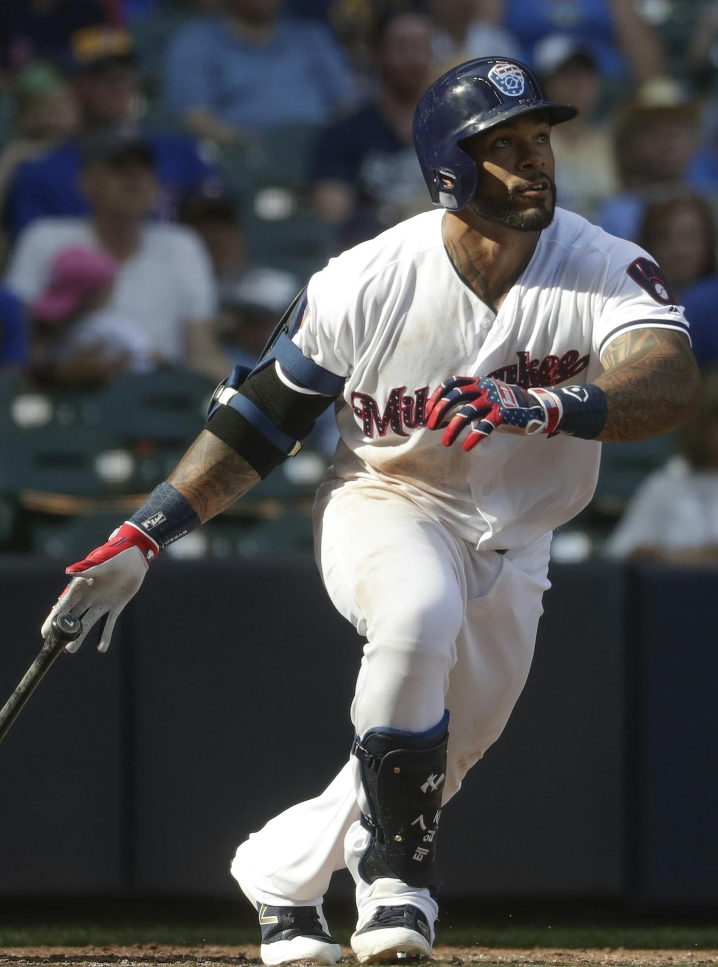 Milwaukee Brewers' Eric Thames hits a two-run home run during the fifth inning of a baseball game against the Minnesota Twins Tuesday, July 3, 2018, in Milwaukee. (AP Photo/Morry Gash)