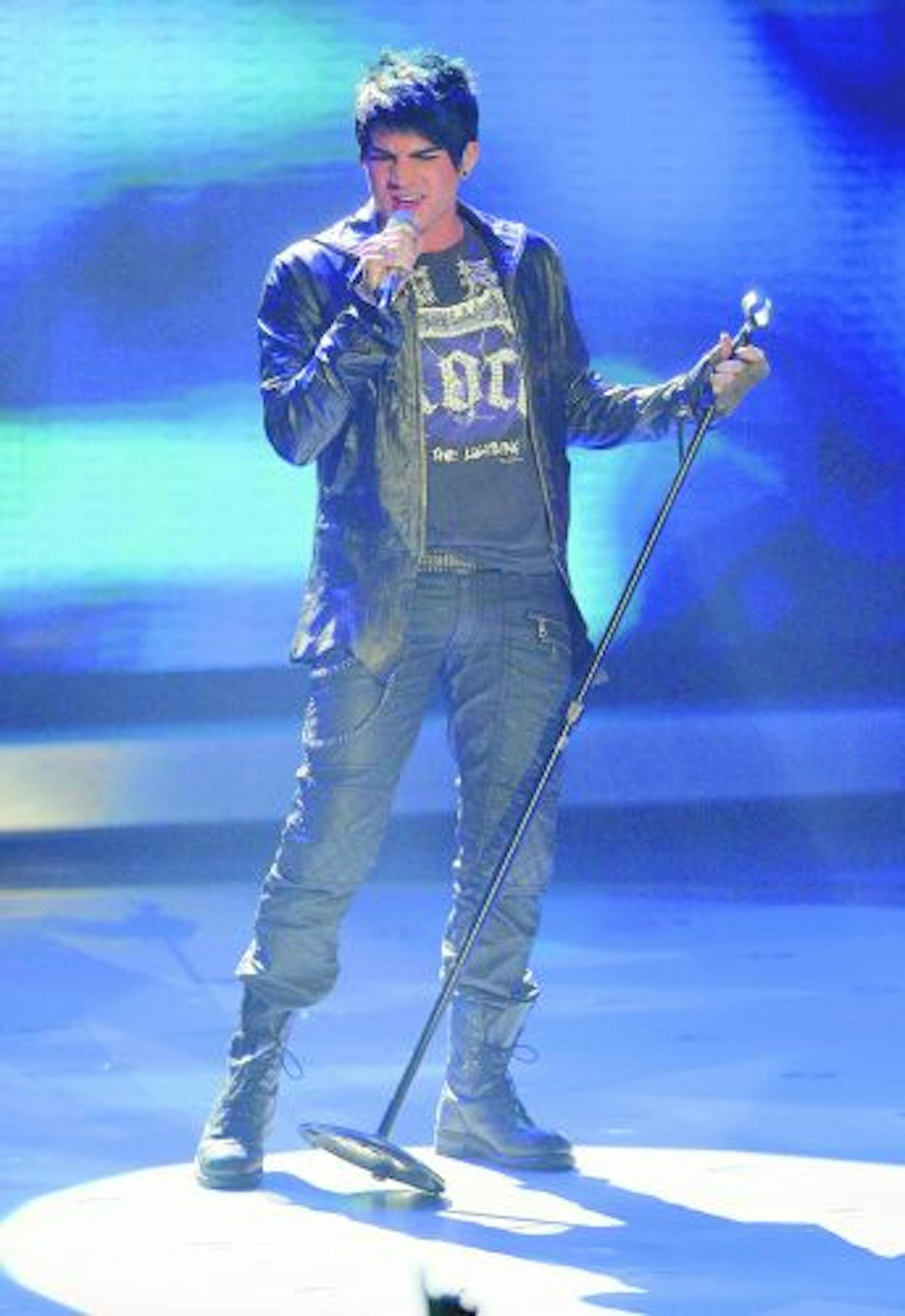 In this photo released by FOX, Adam Lambert performs in front of the judges on American Idol on Tuesday, May 12, 2009 in Los Angeles.