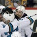 San Jose Sharks' Justin Braun, right, celebrates his goal against the Pittsburgh Penguins with teammates during the third period in Game 2 of the NHL 