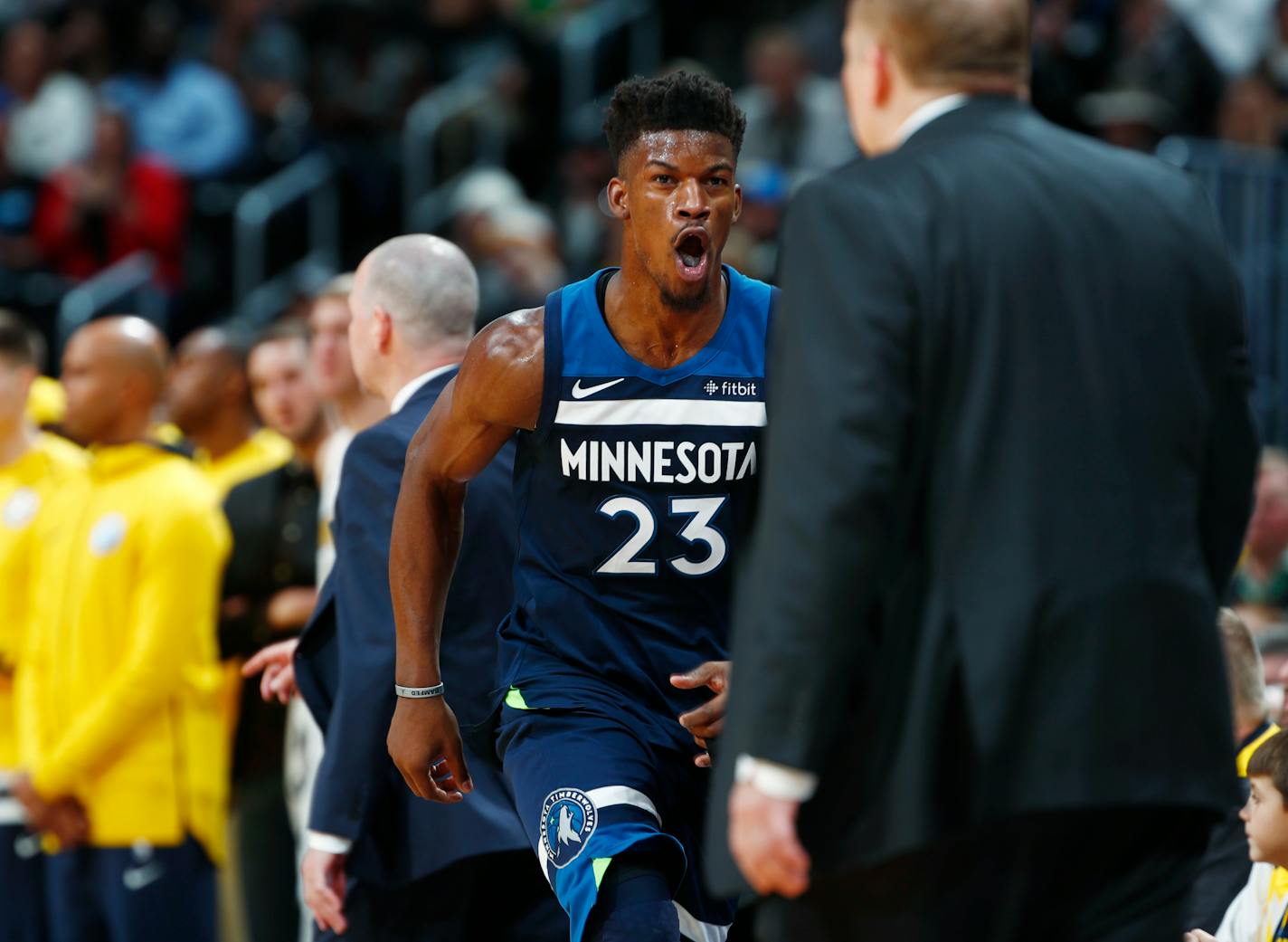 Wolves coach Tom Thibodeau and Jimmy Butler.