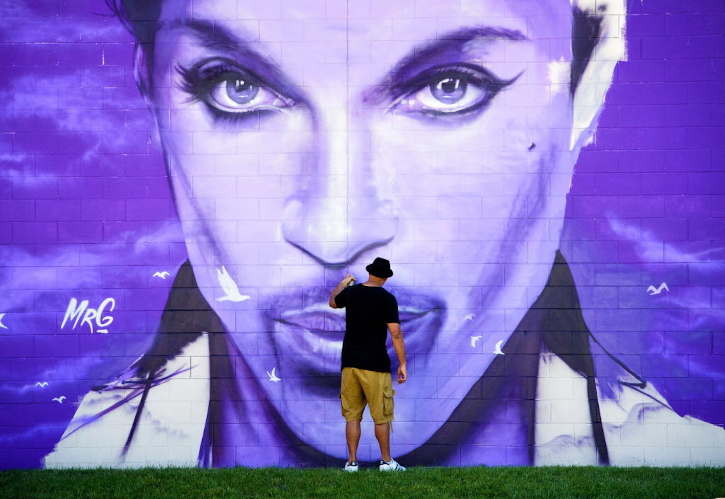 New Zealand mural artist Graham Hoete started painting a mural of Prince on the side of the Chanhassen Cinema on Saturday, June 18. He's planning an official presentation of the mural to the public on Wednesday at 7 p.m. He wants Prince fans to come out and be part of a huge group photo, taken by a drone camera.