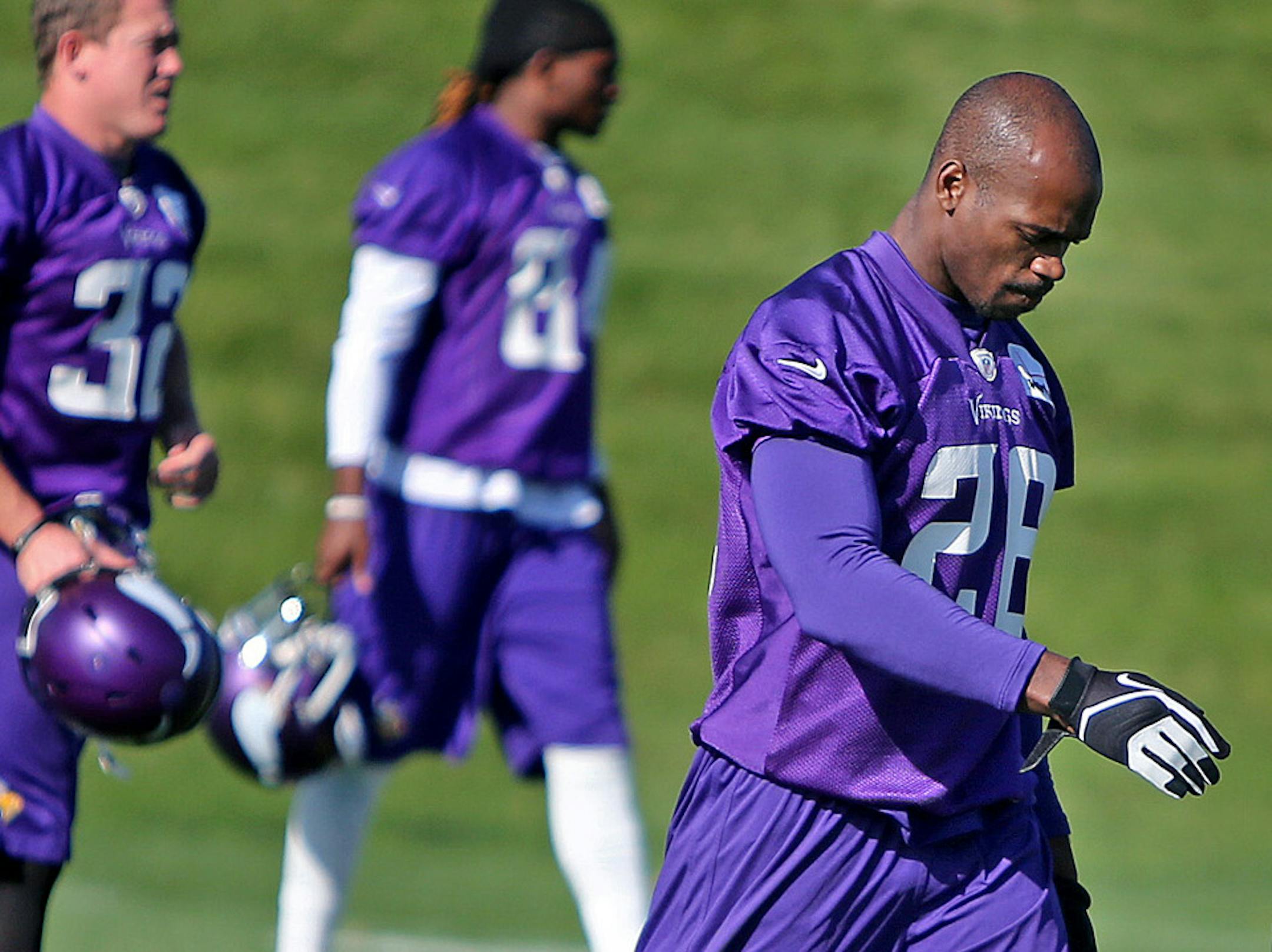 Minnesota Vikings Adrian Peterson made his way onto a practice field during practice at Winter Park, Friday, October 11, 2013 in Eden Prairie, MN. Person's 2-year-old son was badly beaten and on life support in Sioux Falls, S.D. (ELIZABETH FLORES/STAR TRIBUNE) ELIZABETH FLORES • eflores@startribune.com
