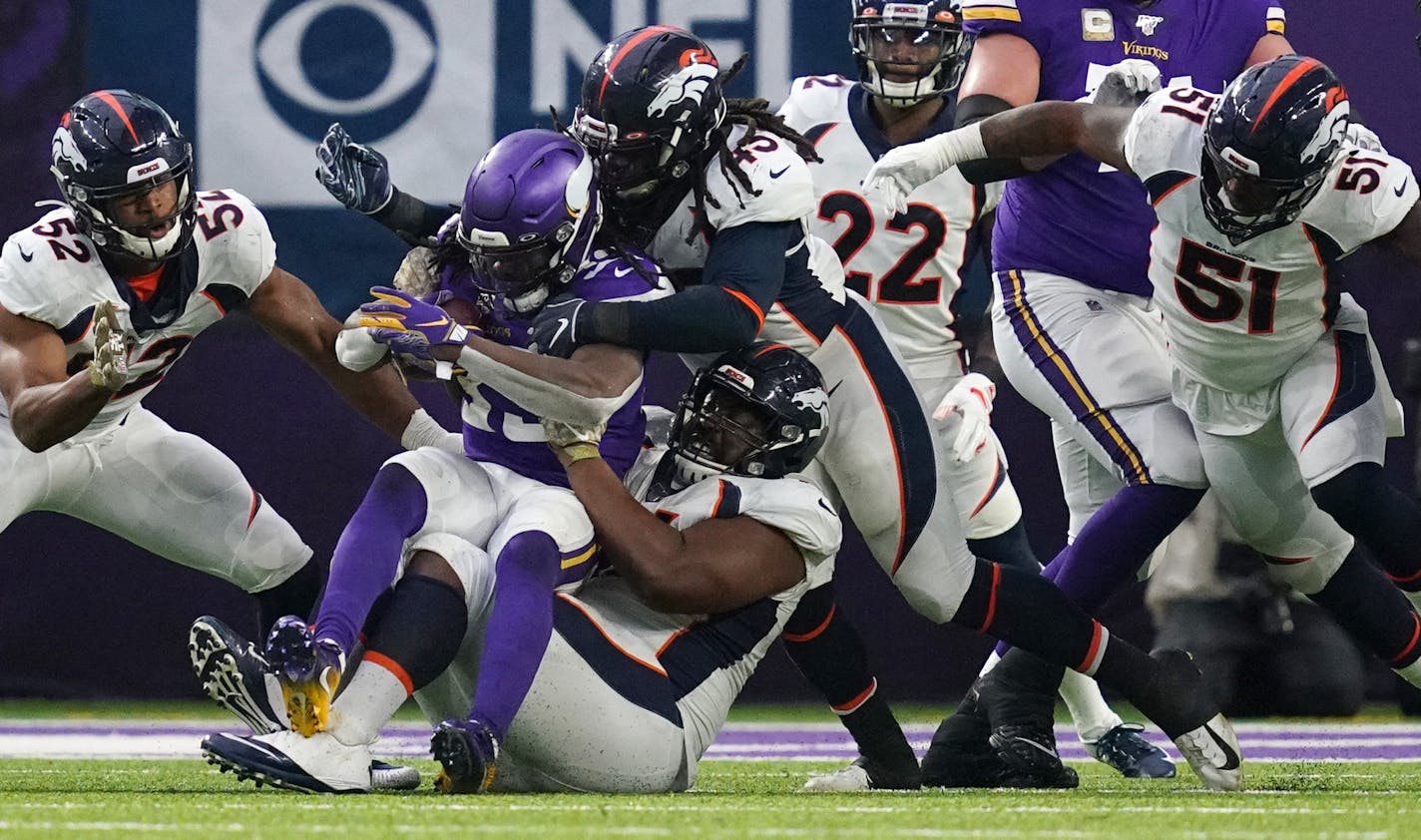 Minnesota Vikings running back Dalvin Cook (33) was brought down as he ran the ball in the third quarter. ] ANTHONY SOUFFLE &#x2022; anthony.souffle@startribune.com The Minnesota Vikings played the Denver Broncos in an NFL game Sunday, Nov. 17, 2019 at U.S. Bank Stadium in Minneapolis.