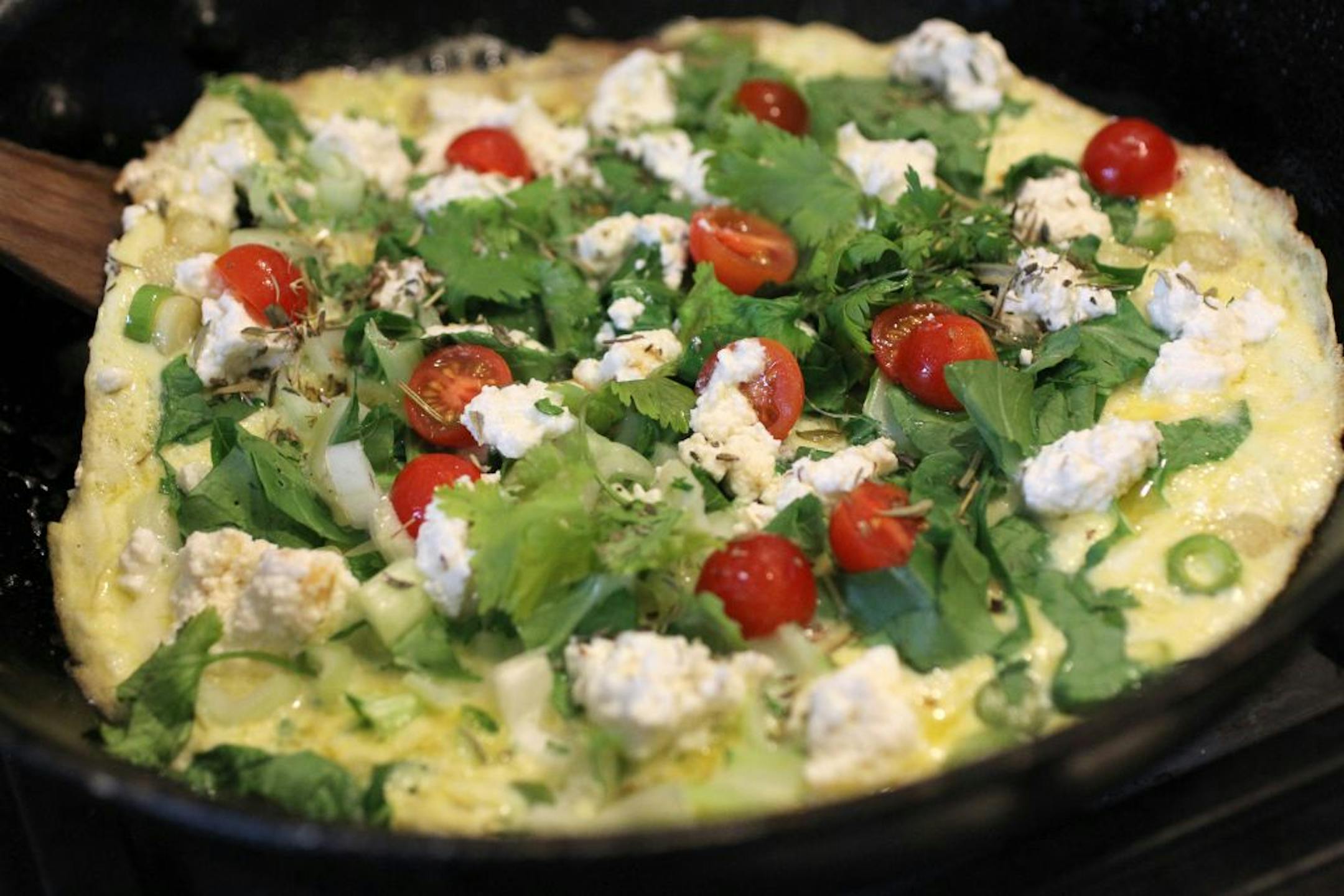 A country breakfast in the making with all locally produced food, including goat cheese.