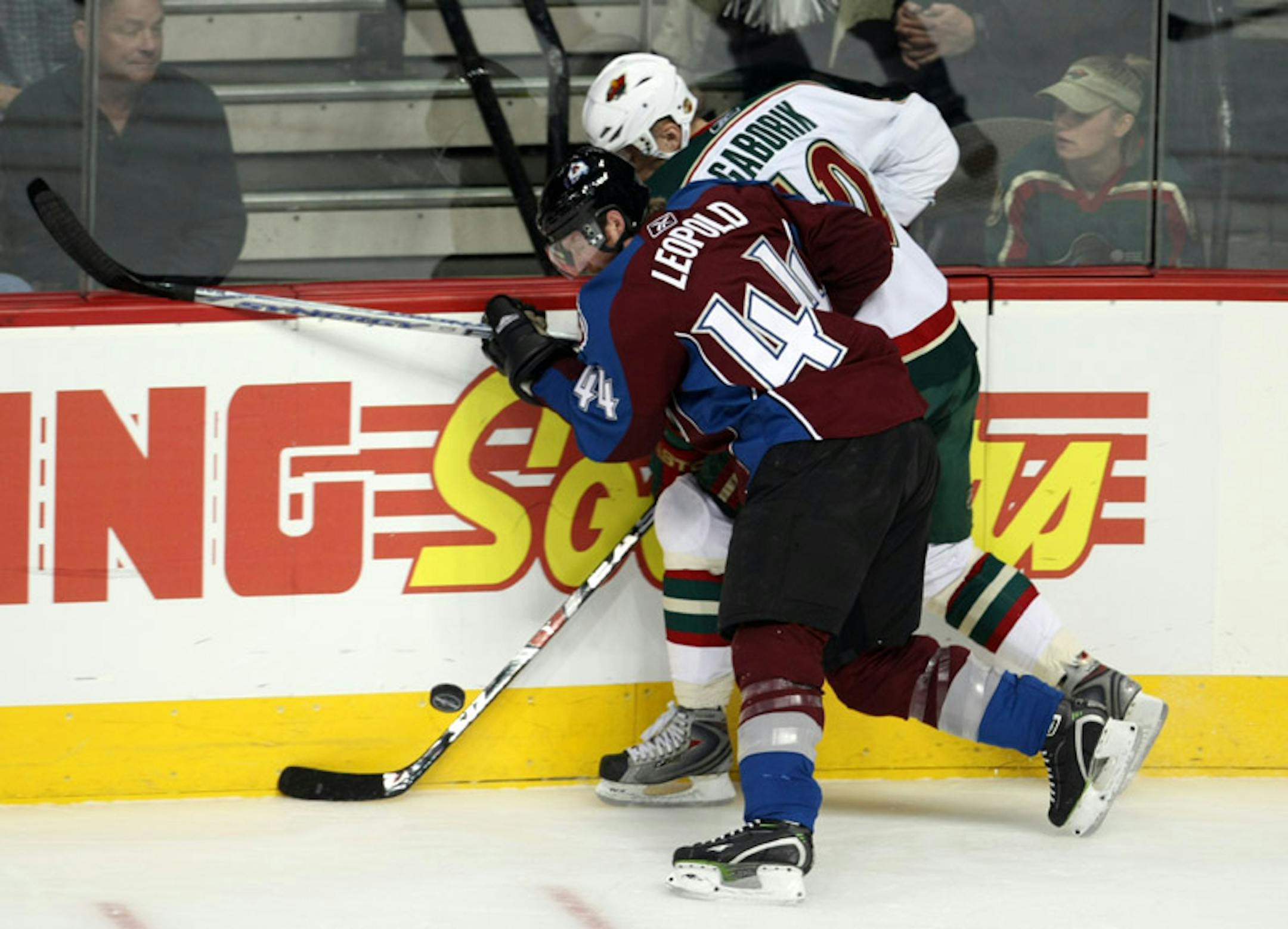 Former Gopher Jordan Leopold (checking Marian Gaborik) rejoined the Avalanche lineup Tuesday night and had two assists