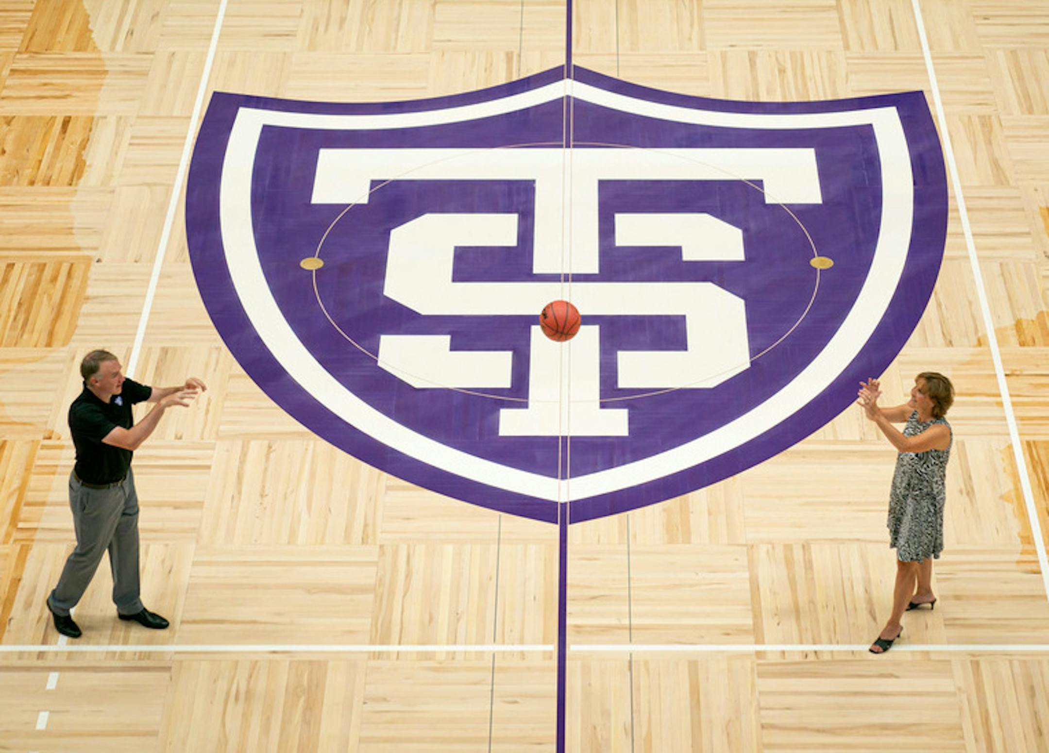 St Thomas men's basketball coach John Tauer and women's coach Ruth Sinn stepped out for the first time onto the newly unveiled basketball court. They hope to play their first division one games during the 2021-2022 season, about 16 months from now. ] GLEN STUBBE • glen.stubbe@startribune.com Friday, July 17, 2020 Thomas men's basketball coach John Tauer and women's coach Ruth Sinn stepped out for the first time onto the newly unveiled basketball court. The Teams hope to play their first division