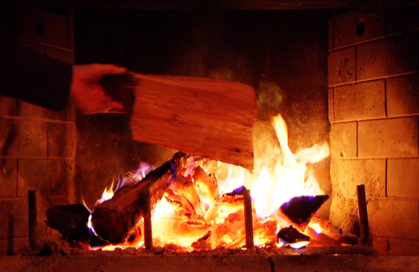 A highlight of many Yule Log videos is when a disembodied arm appears to throw on another log or prod the ashes.