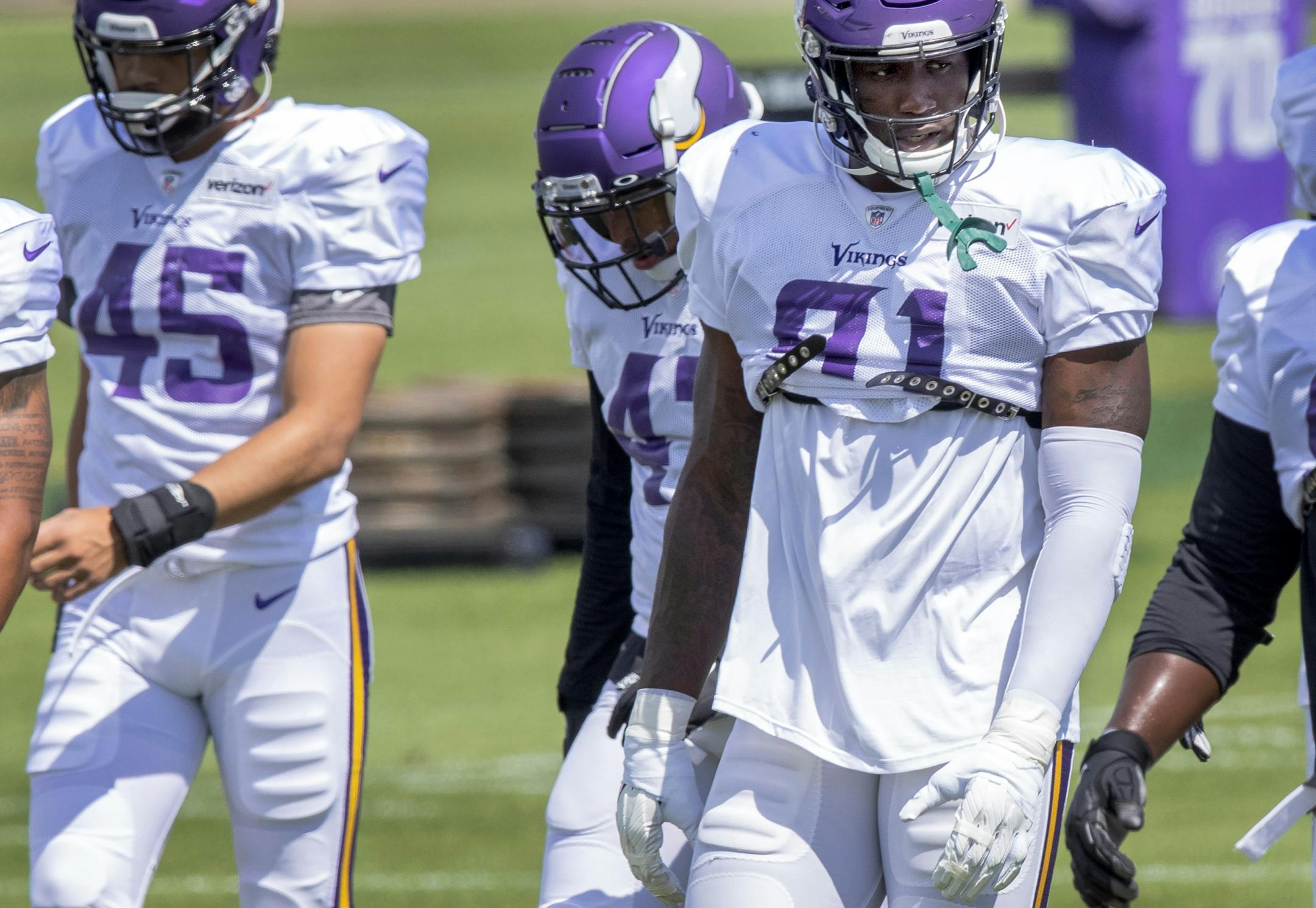 Minnesota Vikings defensive lineman Jalyn Holmes (91).