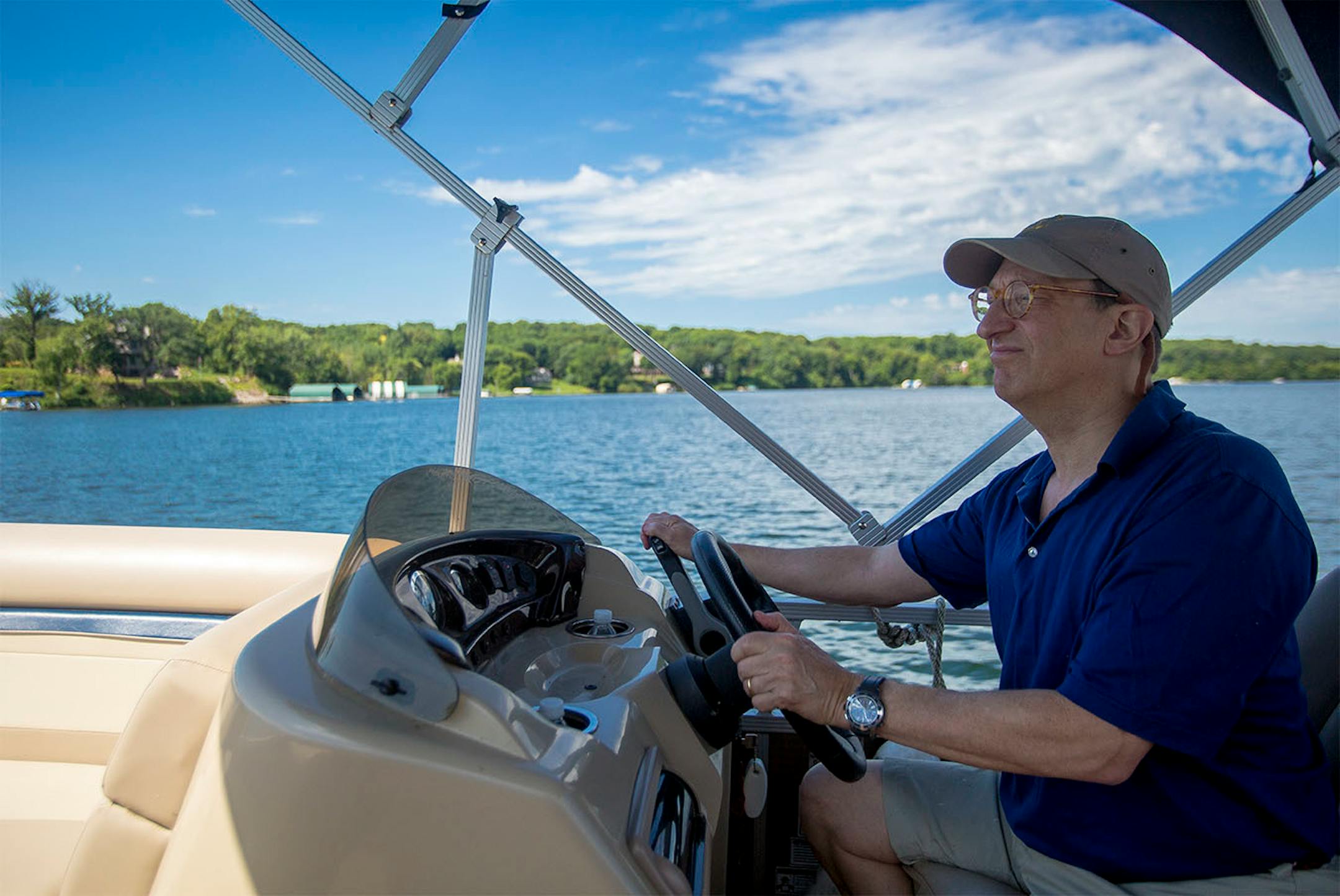 David Moore drives his boat a short distance to the mainland where he can pick up supplies and visitors.