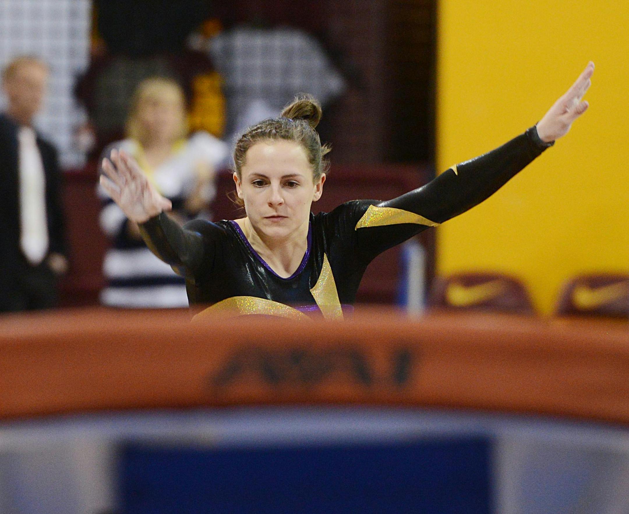 Cretin-Derham Hall gymnast Megan Russell prepares to vault.] BRIDGET BENNETT &#x2022; Special to the Star Tribune bridget.bennett@startribune.com Class 2A Individual and All-Around Championships of the 2015 State Girls Gymnastics Meet at the University of Minnesota Sports Pavilion on Saturday, Feb. 21, 2015. Minneapolis, MN