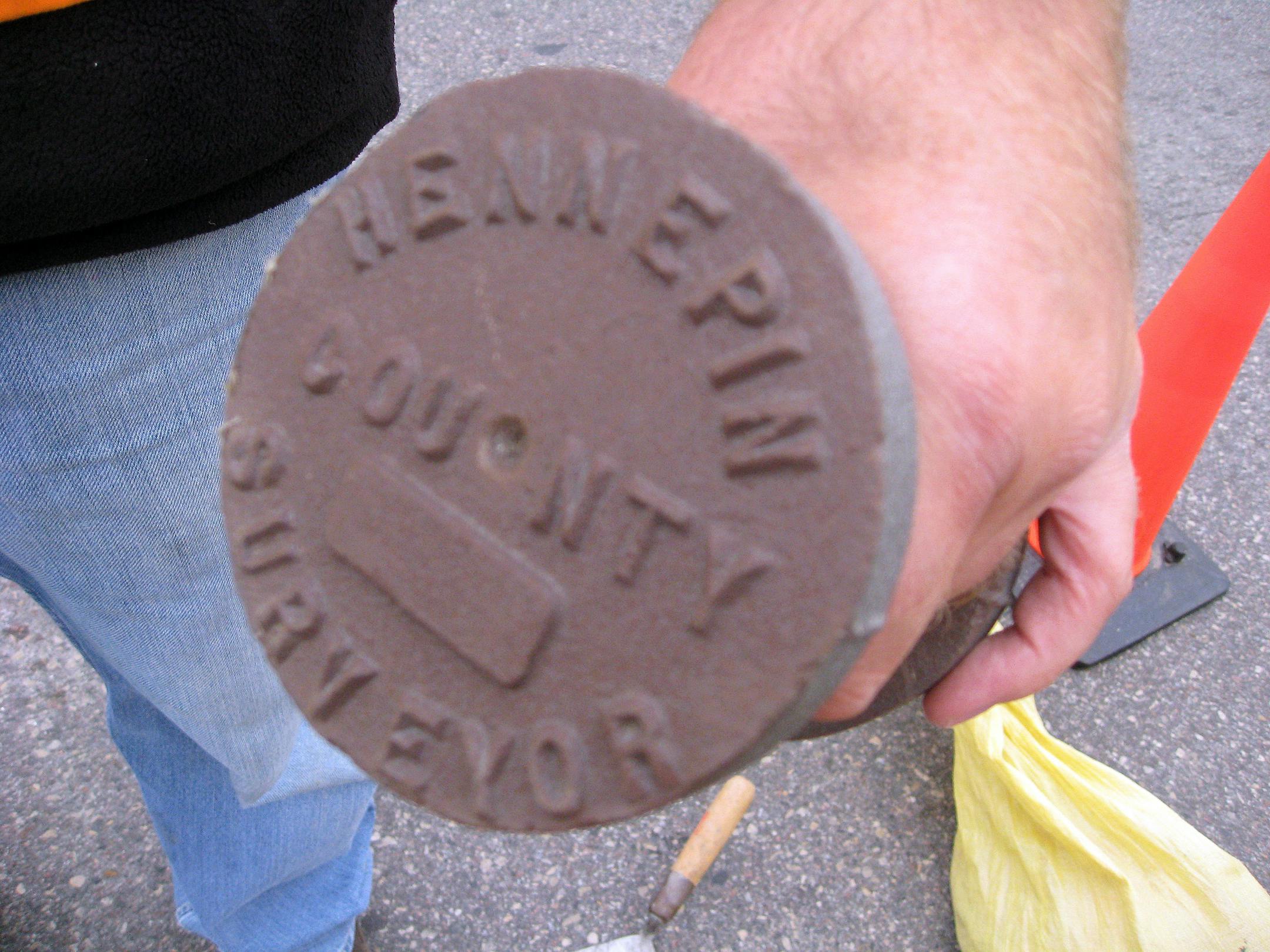 Steve Brandt .. 10.24.2008 ... This is the survey marker being placed by county crews at key points around Minneapolis.