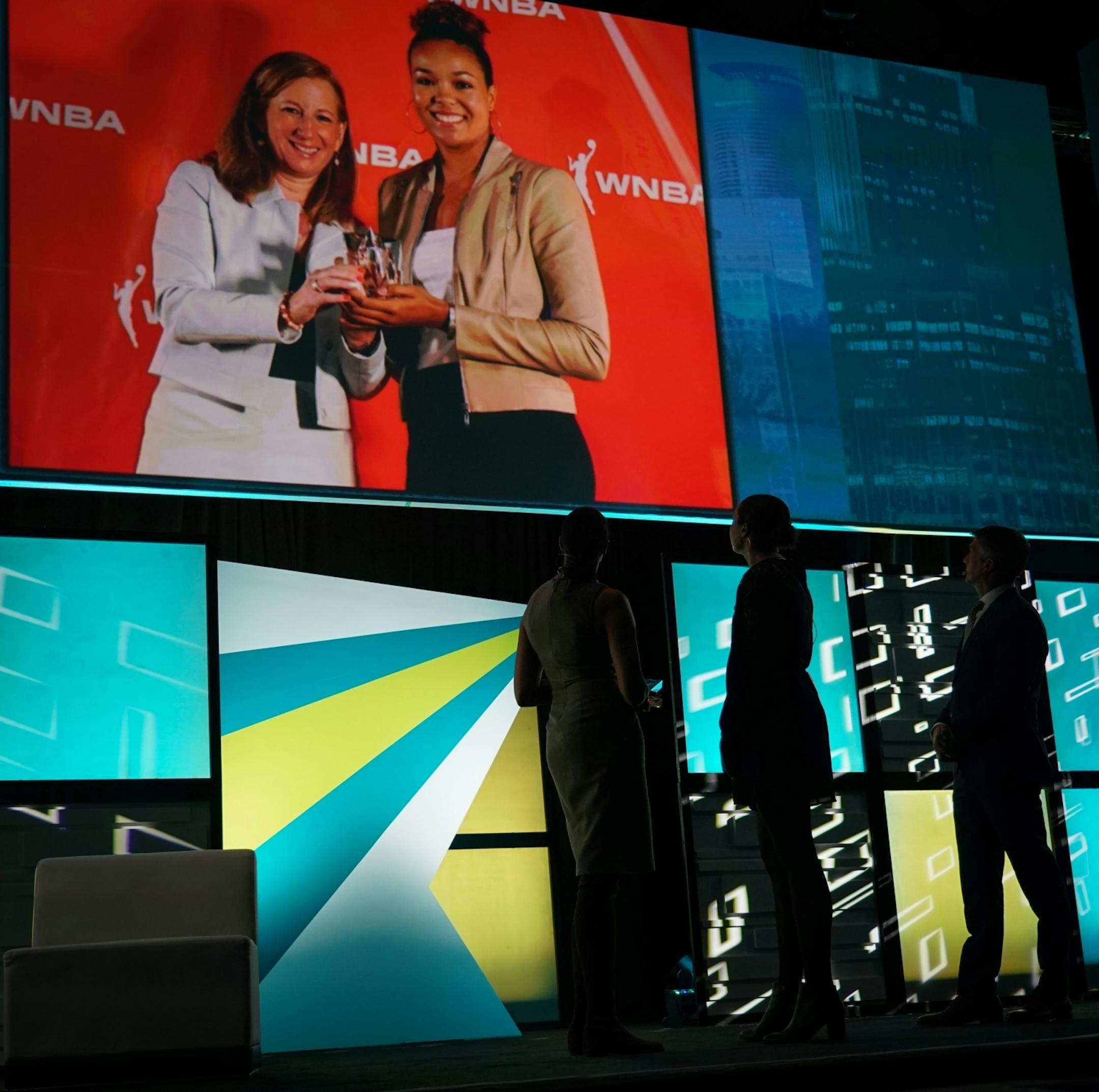 Minnesota Lynx forward and WNBA Rookie of the Year Napheesa Collier (center) watched a highlight video before accepting her award for Professional Athlete of the Year from Lea B. Olson and Anthony LaPanta during the Minnesota Sports Awards presented by Sports Minneapolis.