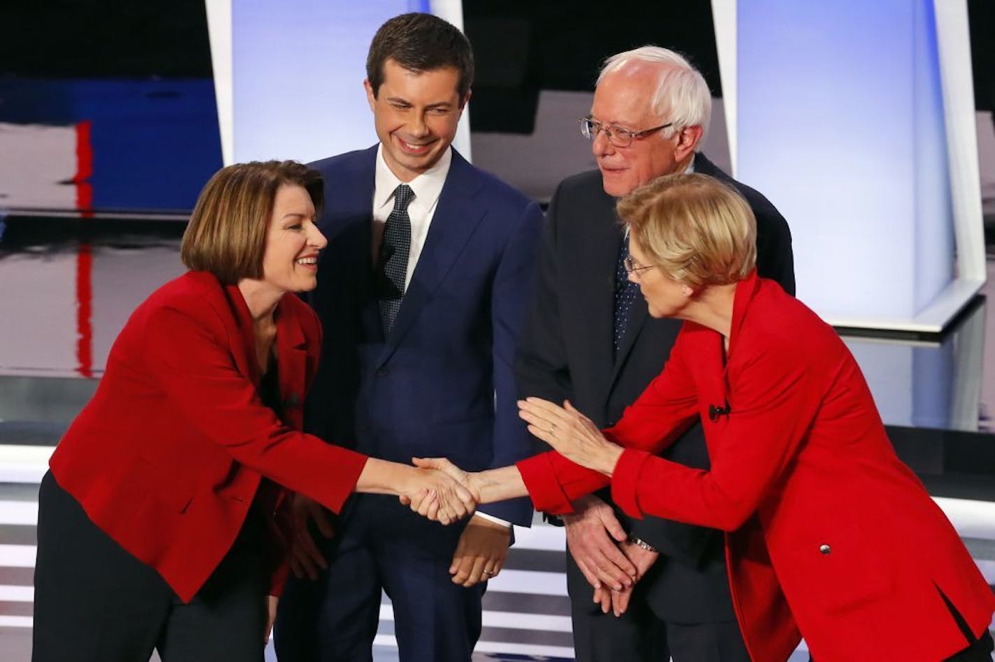 In July, Amy Klobuchar greeted Pete Buttigieg, Bernie Sanders, and Elizabeth Warren before a Democratic presidential debate in Detroit. A new Star Tribune/MPR News Minnesota Poll as the state's March 3 presidential primary nears has Klobuchar and Sanders well ahead of their nearest Democratic rivals.