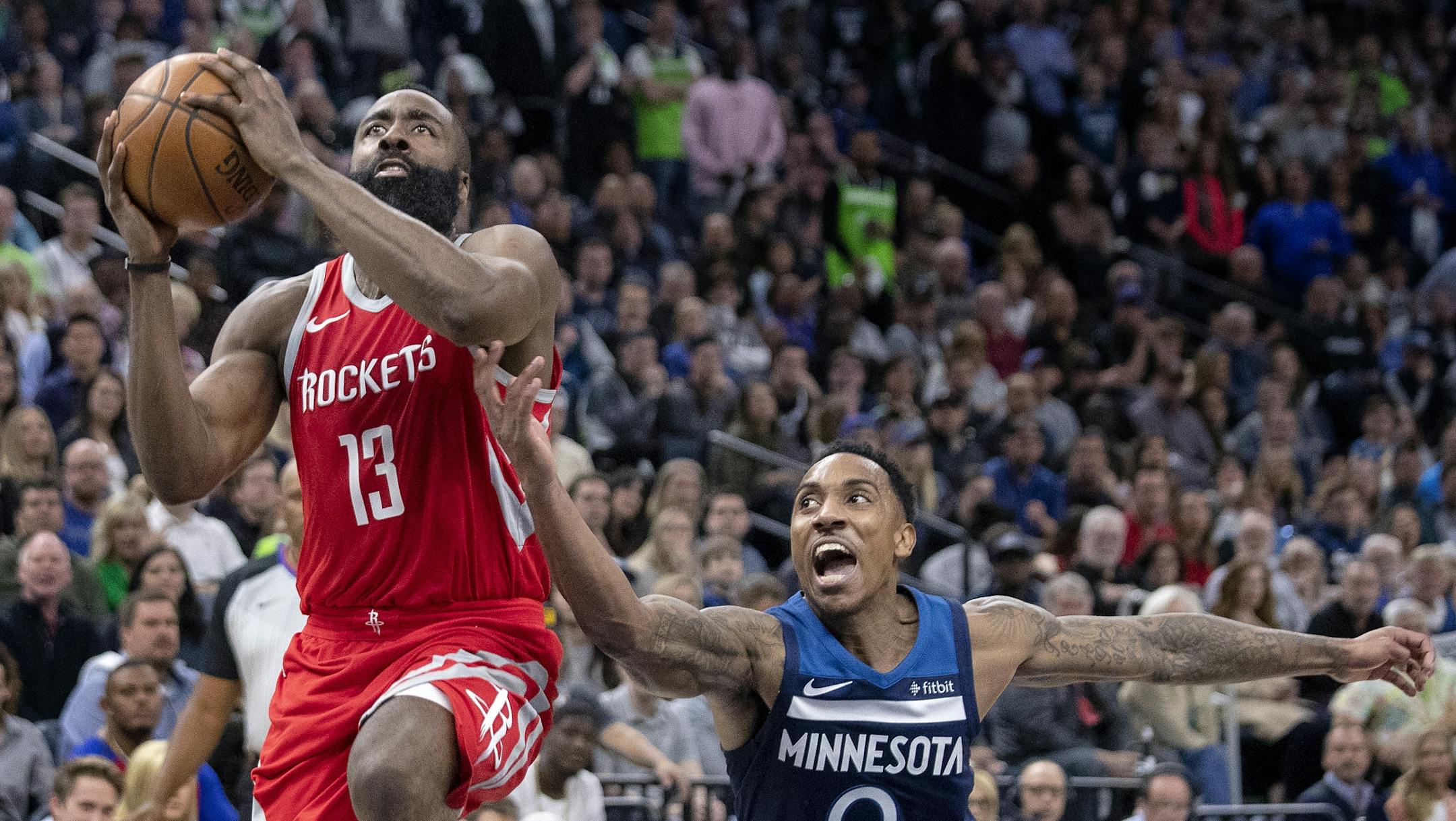 James Harden (13) was defended by Jeff Teague (0) in the fourth quarter.