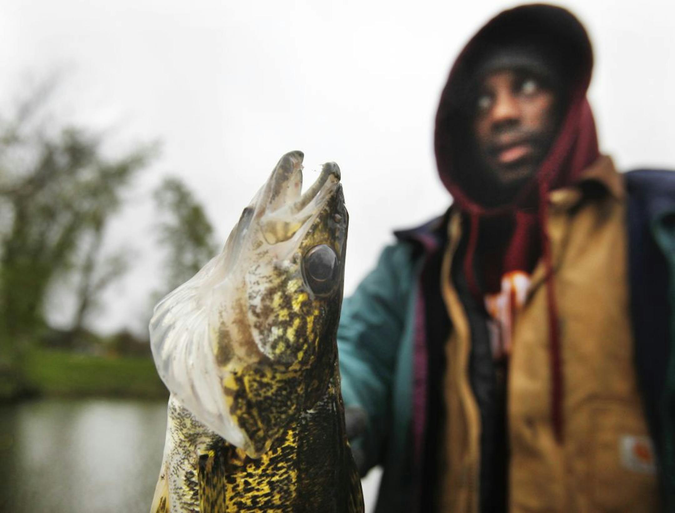 The 2011 state fishing opener came with rain and low temperatures on May 14, but two legislators believe that this year's opener should be set for May 5.