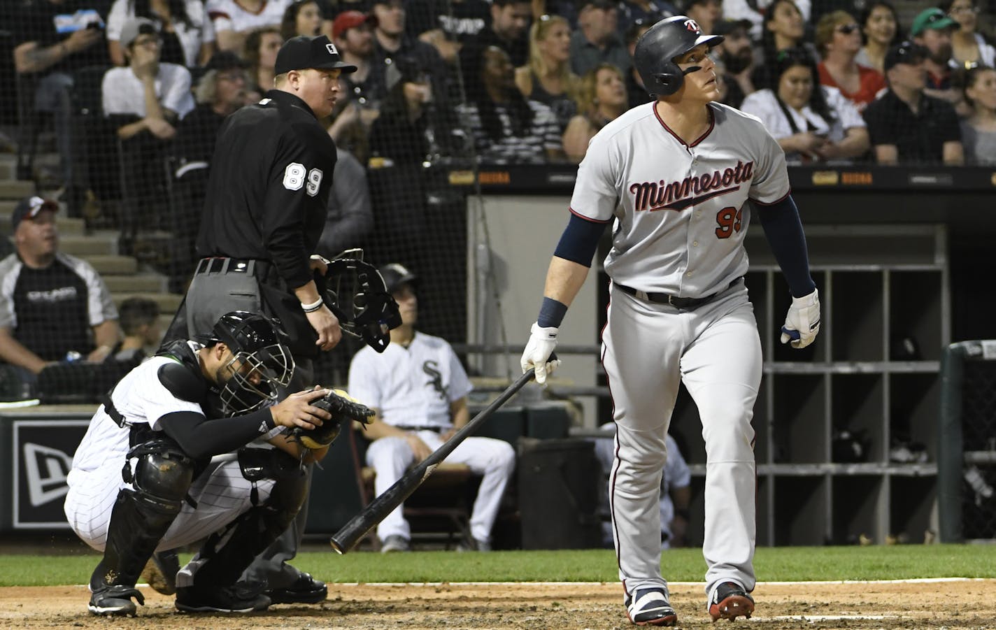 Minnesota Twins' Logan Morrison (99) watches his home run against the Chicago White Sox during the third inning of a baseball game, Friday, May 4, 2018, in Chicago. (AP Photo/David Banks)