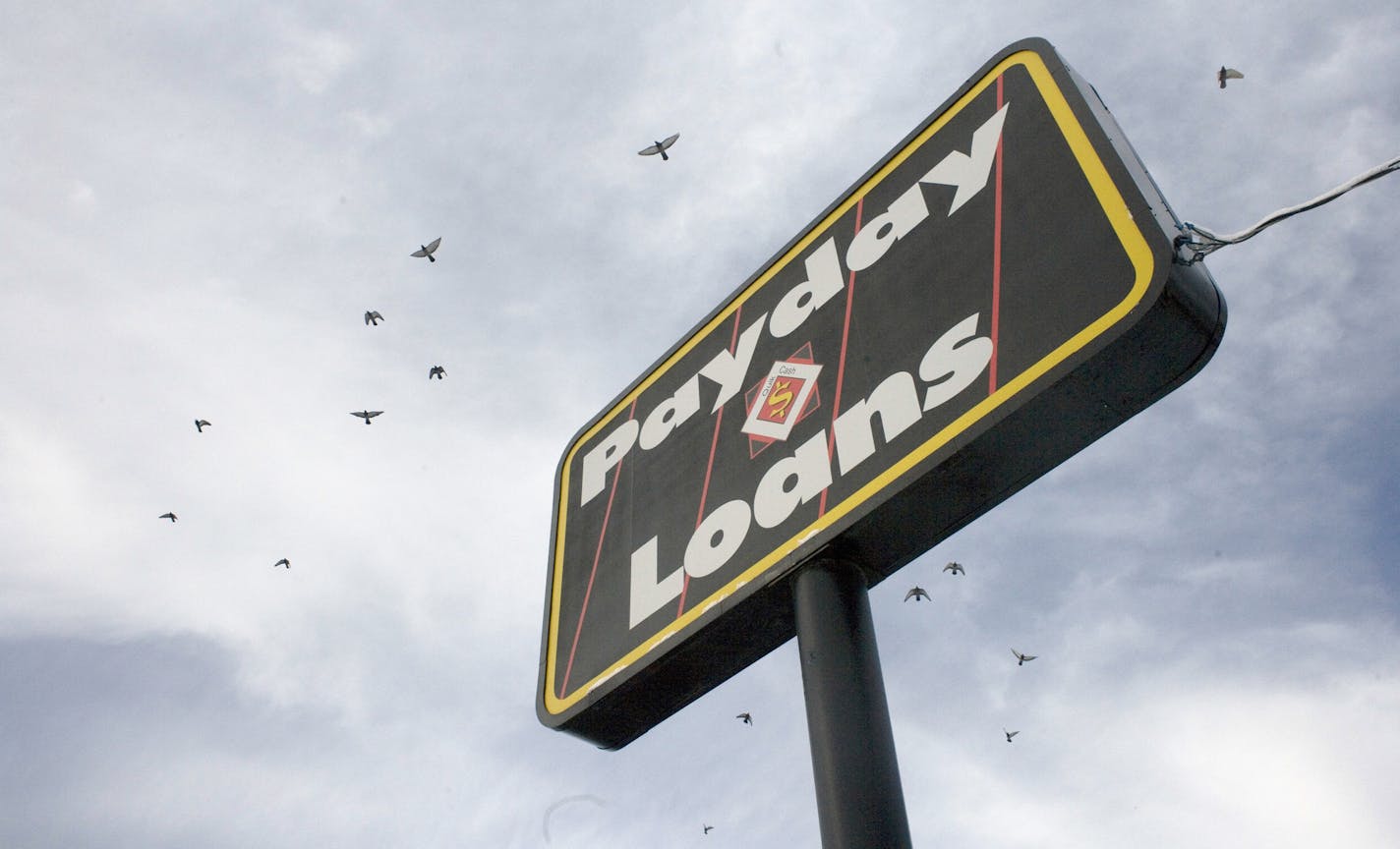 FILE -- A payday loan store on the edge of the Navajo Nation in Gallup, N.M., where a lender could be found on almost every corner, Dec. 18, 2006. Google said on May 11, 2016, that it was no longer going to run payday loan ads, another example of powerful technology companies using their clout to advance their causes in society. (Rick Scibelli Jr./The New York Times)