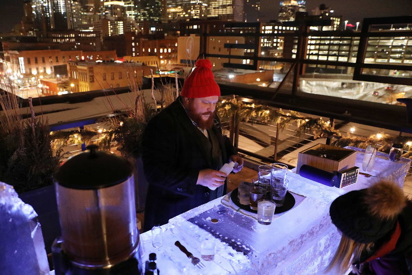 Bartender Nick Kosevich fixed drinks at Hewing Hotel's rooftop ice bar in Minneapolis.