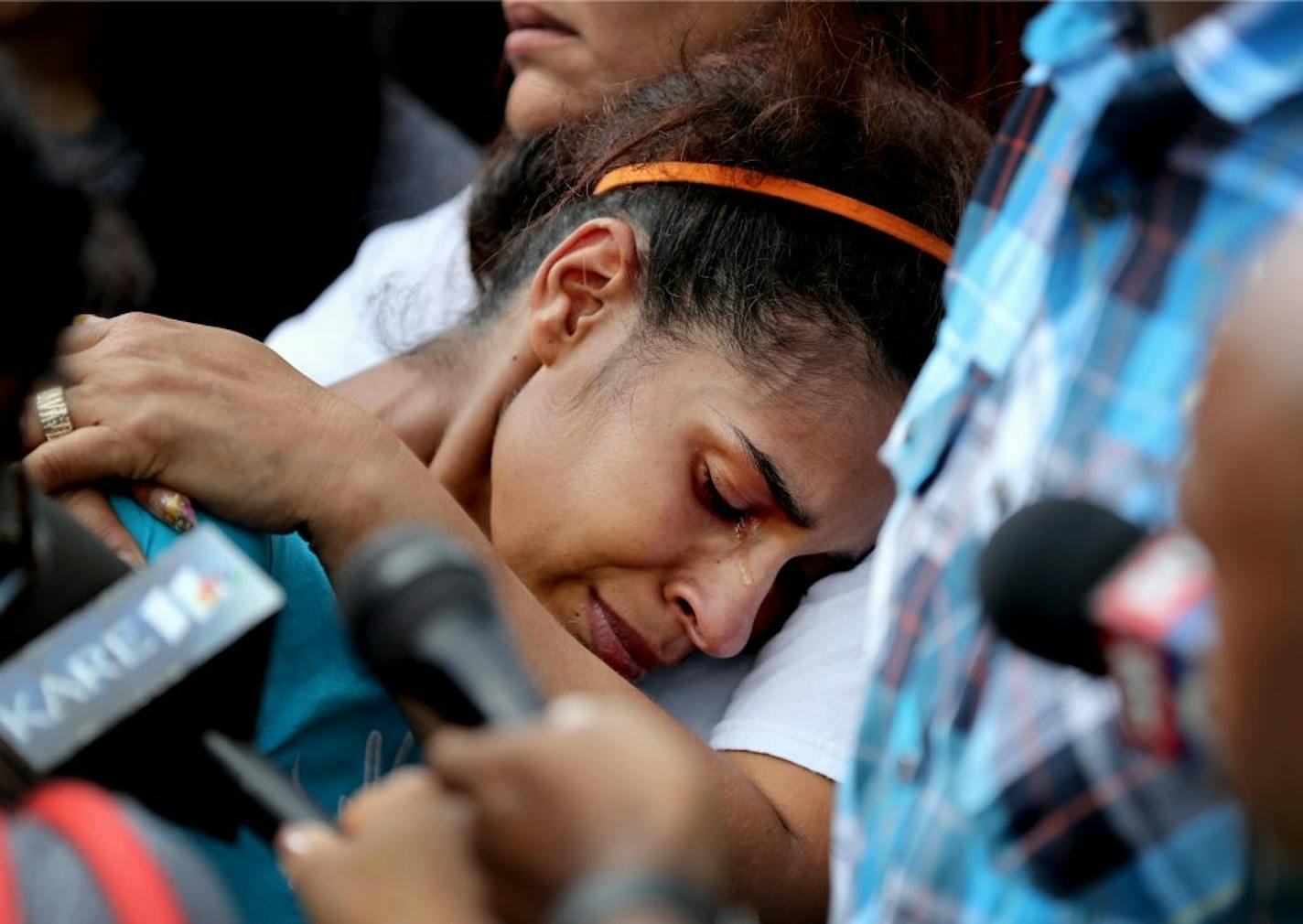 Lashea Jones, the mother of a 2-year old who was shot and killed in north Minneapolis, weeps during a vigil Friday in Minneapolis.