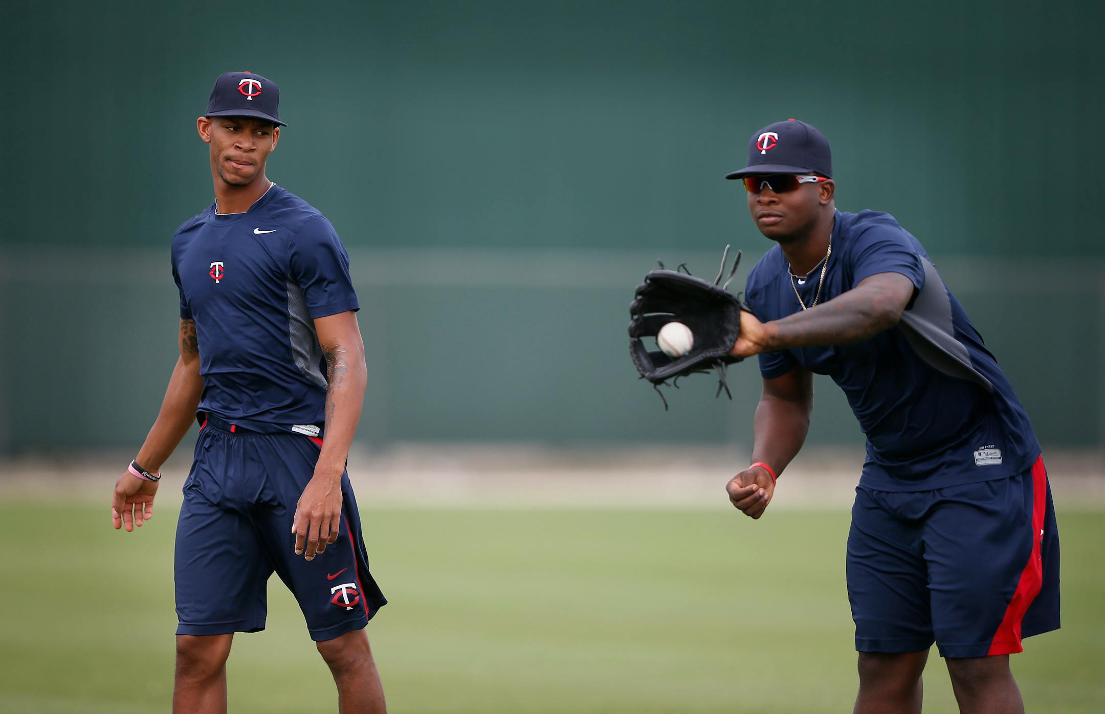 Miguel Sano right caught the ball and tossed the ball for Byron Buxton who is in Fort Myers rehabbing his left wrist. Sano is out for the season after having Tommy John surgery on his right elbow. Minnesota Twins center fielding prospect Byron Buxton remains out with an left wrist injury and continues to rehab it June 3, 2014 in Fort Myers ,Florida. ] Jerry Holt Jerry.holt@startribune.com