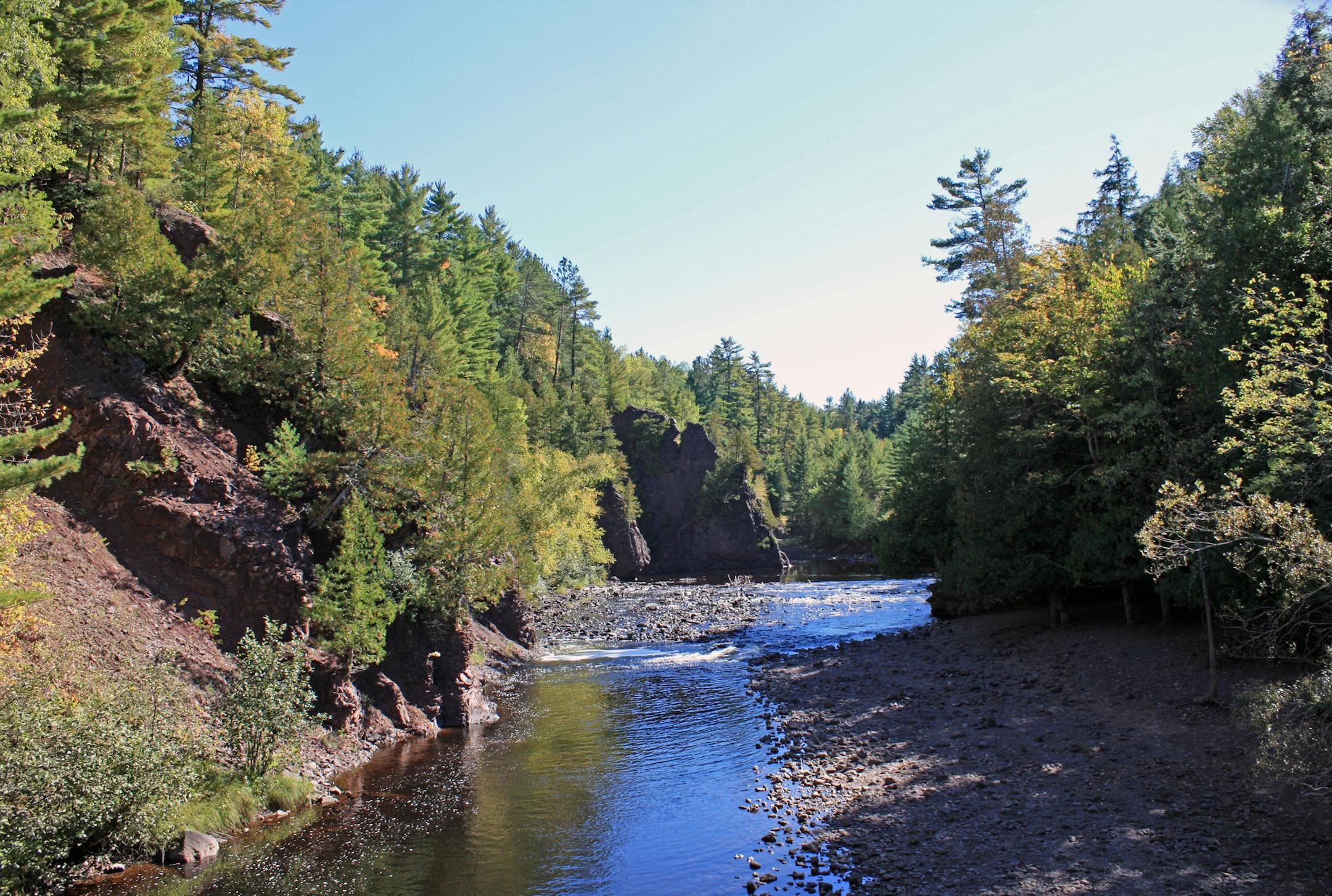 A footbridge over the Bad River provides a view of Devil&#x2019;s Gate in Copper Falls State Park.