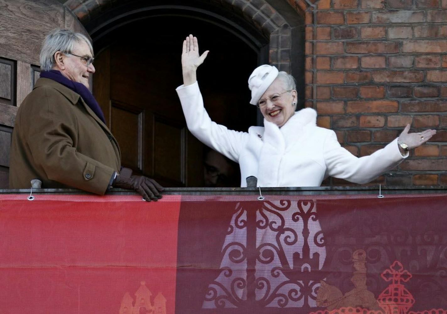 Danish Queen Margrethe and Prince Consort Henrik at City Hall in Copenhagen on Saturday, Jan. 14, 2012. Tens of thousands of flag-waving Danes braved near-freezing temperatures to cheer Denmark's popular figurehead monarch as she celebrated 40 years on the throne.