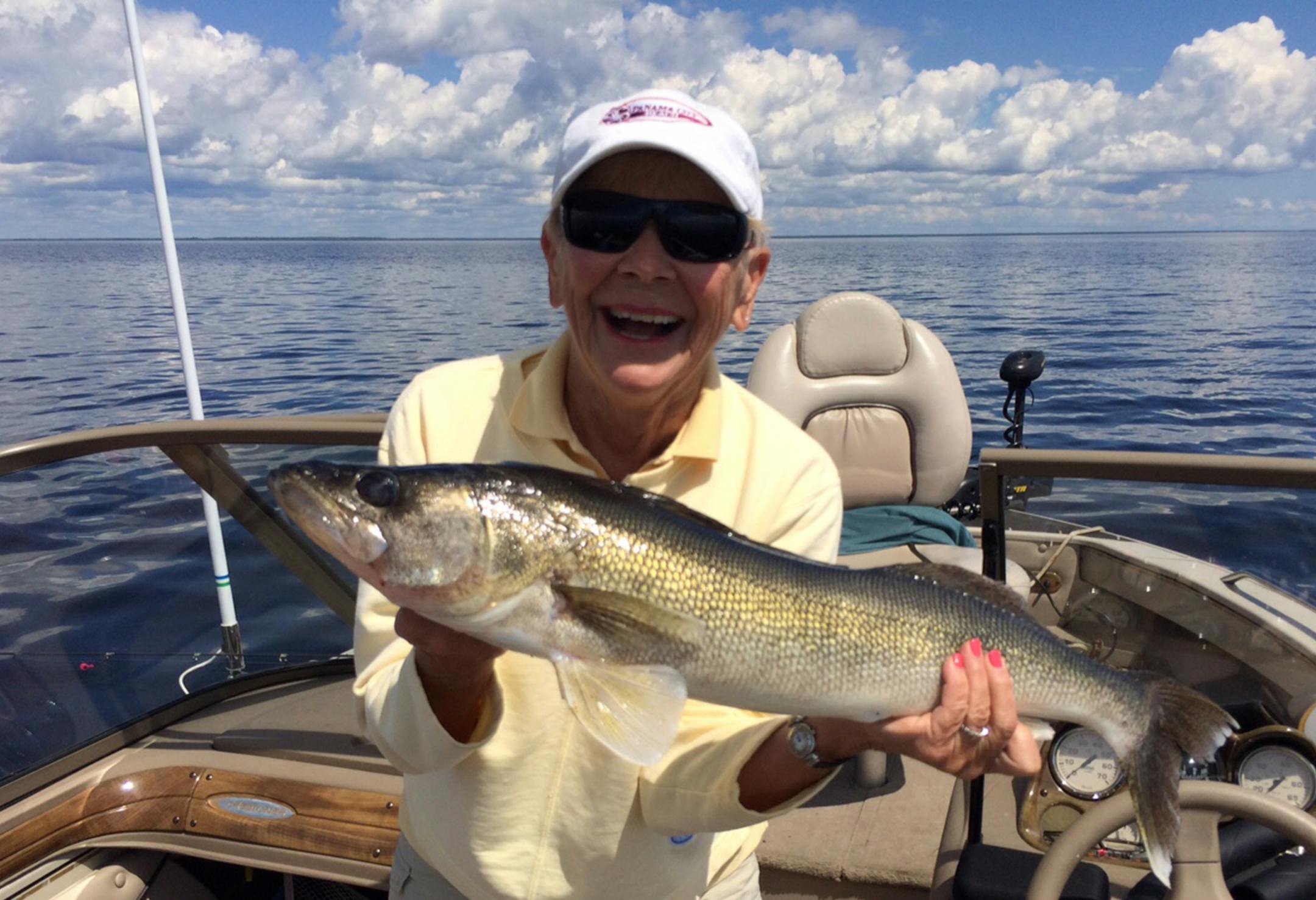 Bette Bryan, 75, of Chanhassen with a 30-inch walleye she caught and released this month on Lake of the Woods.