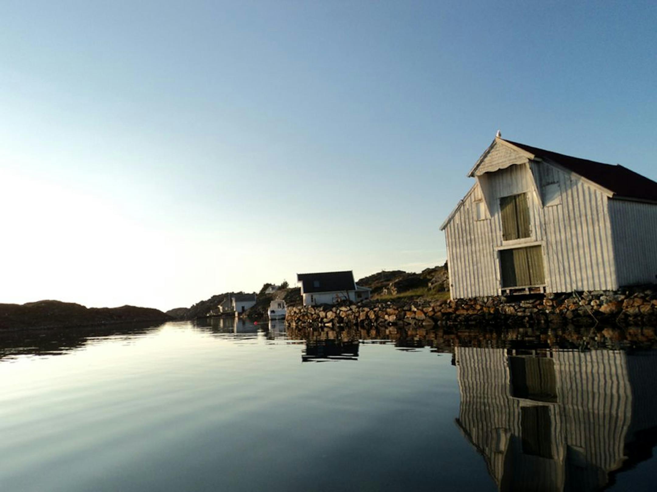 Photographer: Kimberly Froiland of Loquard, Germany. The scene: Boathouses and buildings line the shore on the island of Feoy in Norway. Froiland, a Bloomington native, was visiting friends in Norway for what's called the St. Hans Aften, a summer solstice celebration. "I like the play of light in this picture and hoped that others would enjoy the summeryness of the image," she wrote in an e-mail.
