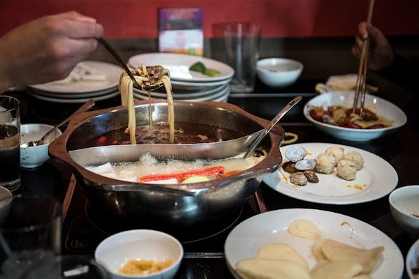 Diners ate at Little Szechuan Hot Pot in St. Paul Wednesday night.