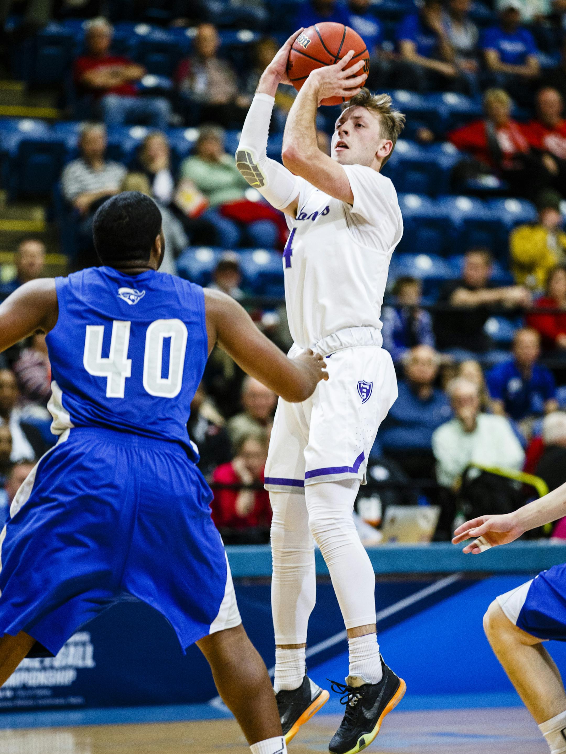 Grant Shaeffer puts up a shot during the NCAA Division III men's basketball semi-final game March 18, 2016 at the Salem Civic Center in Salem, Va. The University of St. Thomas Tommies defeated the Christopher Newport University Captains by a final score of 86-76.