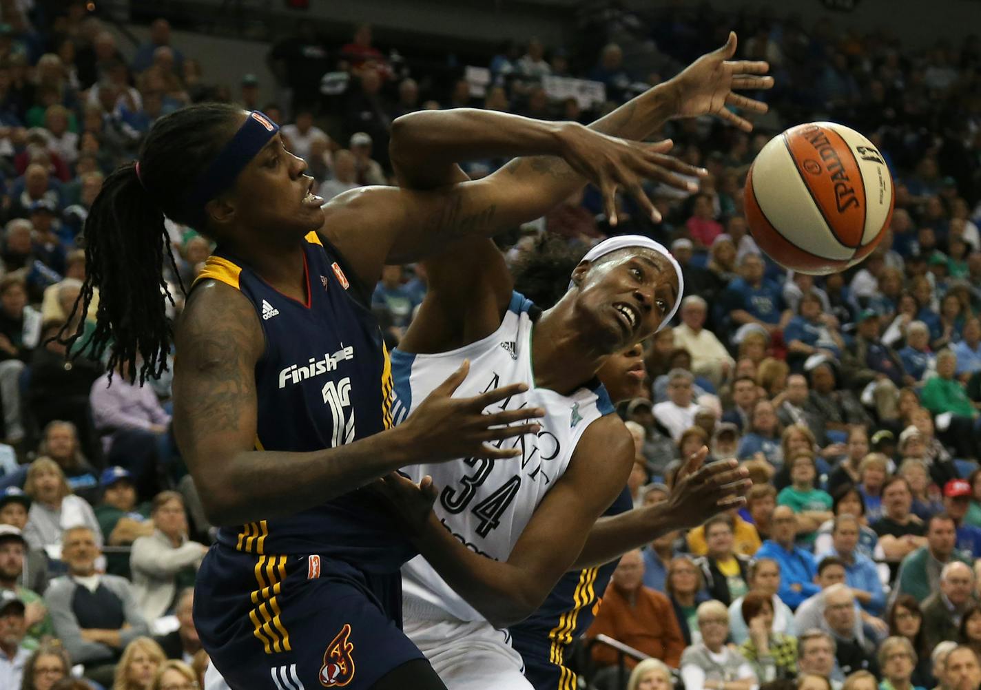 Lynx Sylvia Fowles got fouled by Indiana's Lynetta Kizer during the first half ] (KYNDELL HARKNESS/STAR TRIBUNE) kyndell.harkness@startribune.com Game 1 of the WNBA Finals Lynx vs Indiana at the Target Center in Minneapolis Min., Sunday October 4, 2015.