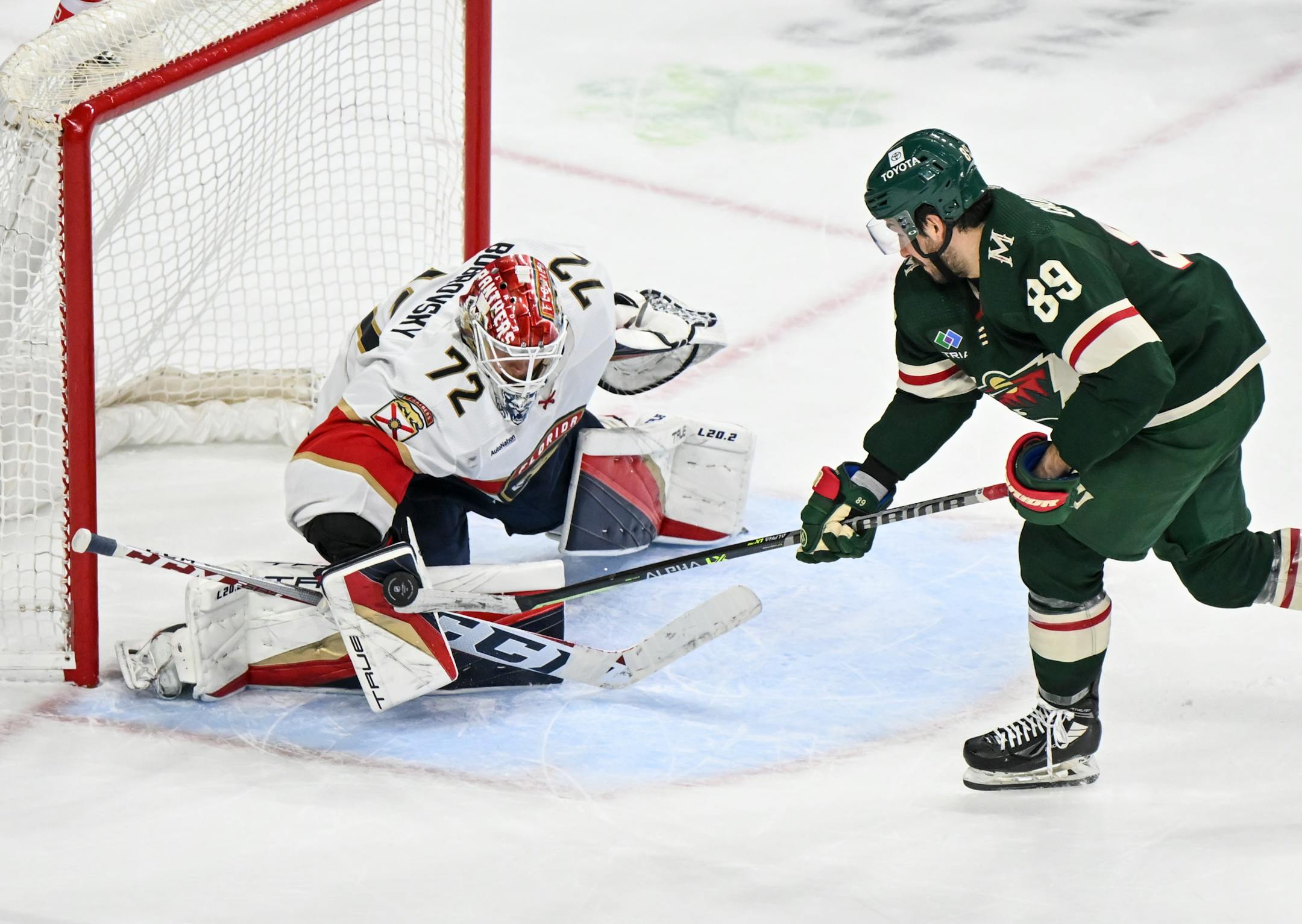 Florida Panthers goaltender Sergei Bobrovsky (72) blocks a shot by Minnesota Wild center Frederick Gaudreau (89) during an overtime shootout.