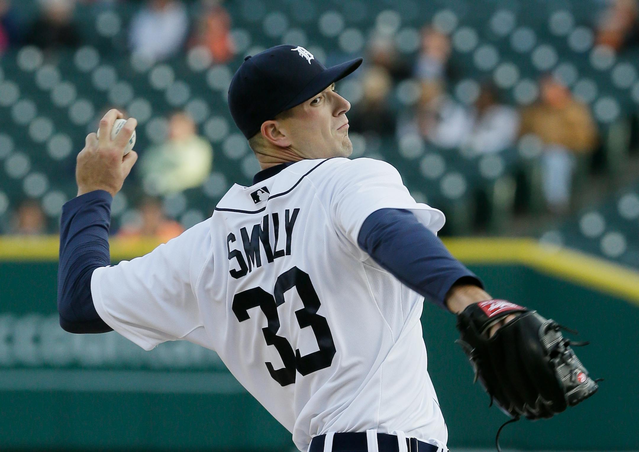 Detroit Tigers starting pitcher Drew Smyly throws during the first inning of a baseball game against the Chicago White Sox in Detroit, Wednesday, April 23, 2014. (AP Photo/Carlos Osorio)