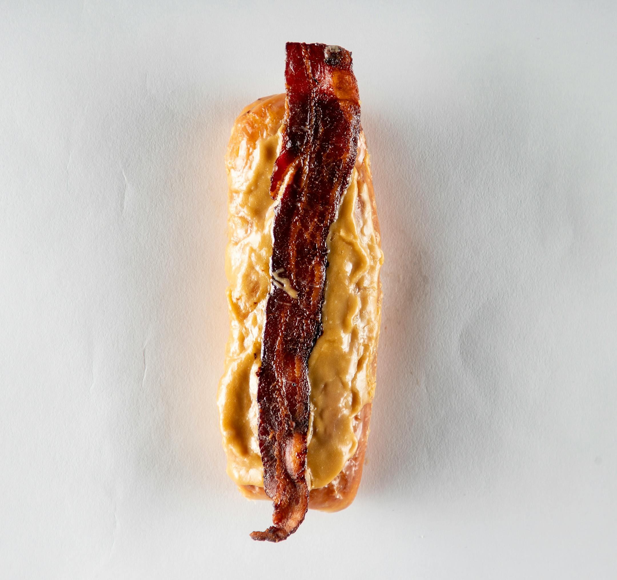 Maple and bacon Long John from Mojo Monkey Donuts.