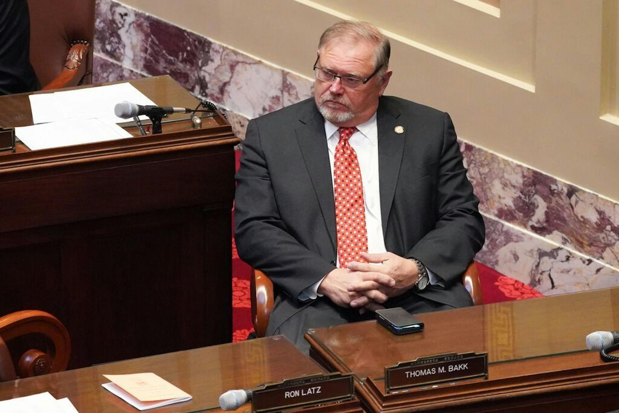 Sen. Tom Bakk, DFL-Cook, listened as new Senate Minority Leader Susan Kent, DFL-Woodbury, thanked him for his leadership in February. Bakk, who is leaving the DFL to become an independent, said Democrats have steadily moved too far to the left for many rural voters.