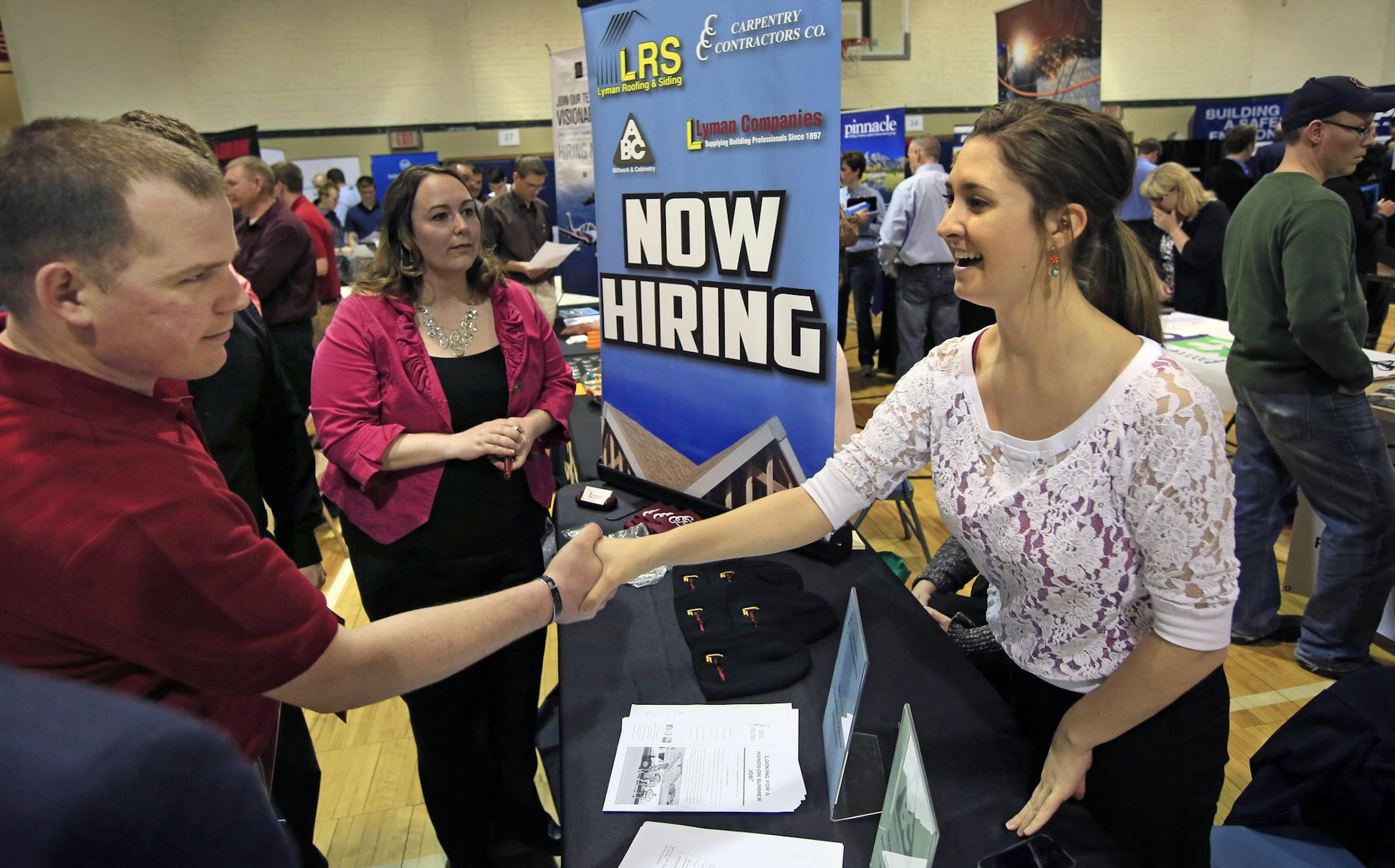 Double-digit increases in new home sales and a surge in remodeling activity in the Twin Cities metro is fueling demand for carpenters, framers and other subcontractors. Here, Kaylie Joseph (right) introduces Dunwoody student Randy Iverson of Coon Rapids to Lyman Companies who now have high demand for skilled workers. ] BRIAN PETERSON &#x201a;&#xc4;&#xa2; brianp@startribune.com Minneapolis, MN - 04/25/2013