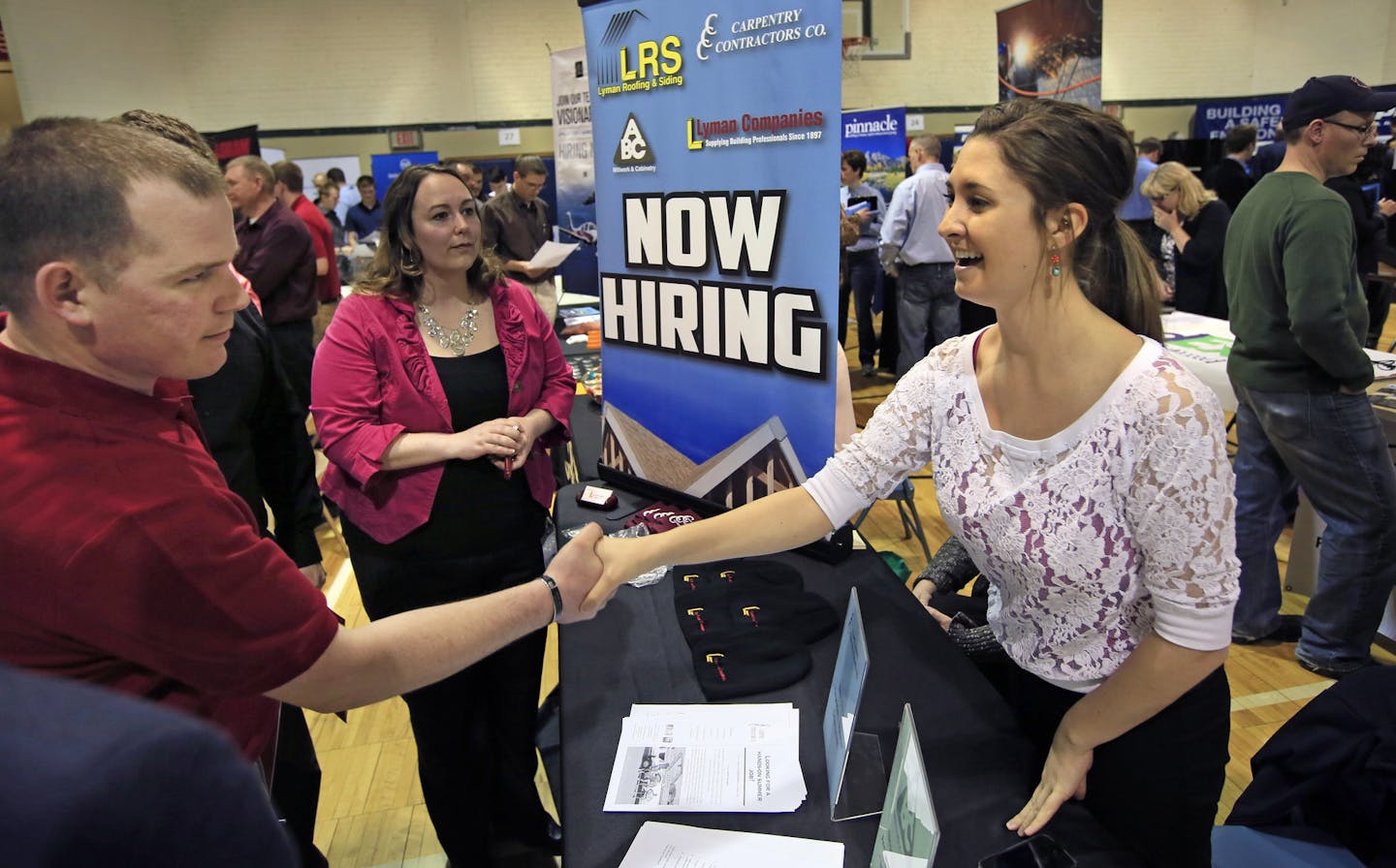 Double-digit increases in new home sales and a surge in remodeling activity in the Twin Cities metro is fueling demand for carpenters, framers and other subcontractors. Here, Kaylie Joseph (right) introduces Dunwoody student Randy Iverson of Coon Rapids to Lyman Companies who now have high demand for skilled workers. ] BRIAN PETERSON &#x201a;&#xc4;&#xa2; brianp@startribune.com Minneapolis, MN - 04/25/2013