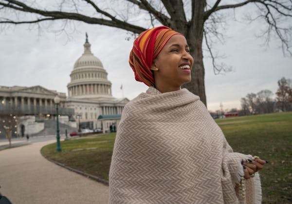 Congresswoman-elect Ilhan Omar walked from her new office in the Longworth House Office Building to the U.S. Capitol, a few hours before being sworn i