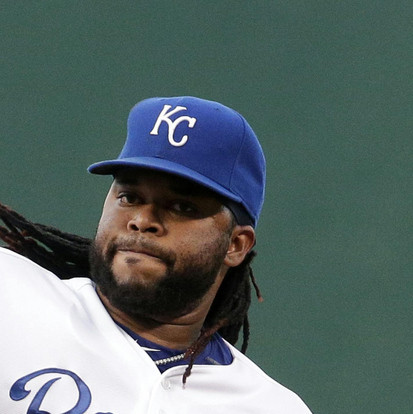 Kansas City Royals starting pitcher Johnny Cueto throws during the first inning of a baseball game against the Detroit Tigers Tuesday, Sept. 1, 2015, in Kansas City, Mo. (AP Photo/Charlie Riedel) ORG XMIT: OTKCR