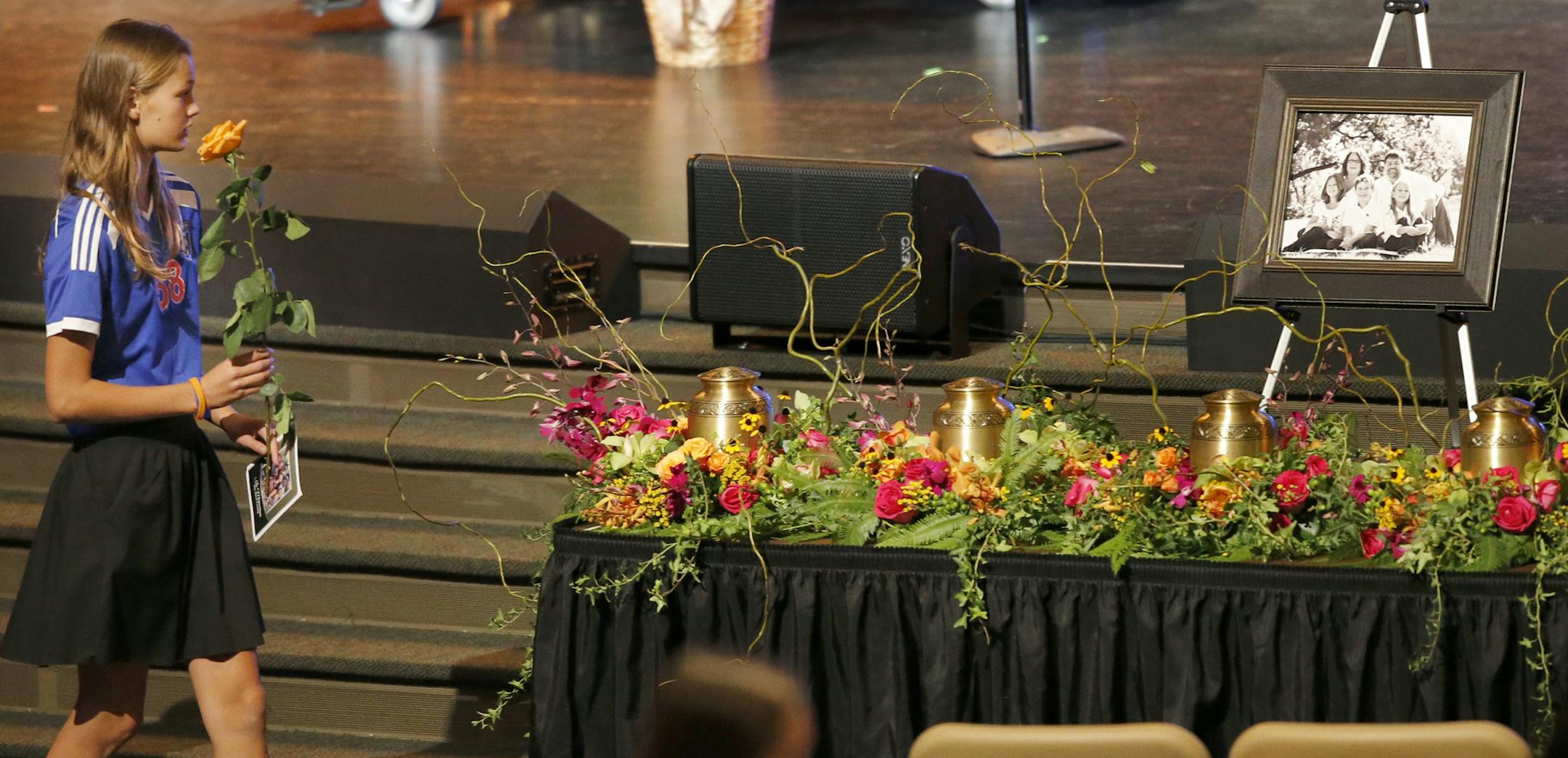 At Grace Church in Eden Prairie, a memorial service was held for the Short family from Greenwood which took the lives of a family of five in a murder/suicide. Soccer friends of Brooklyn brought roses for the family.]Richard Tsong-Taatarii/rtsong-taatarii@startribune.com ORG XMIT: MIN1509201830331027