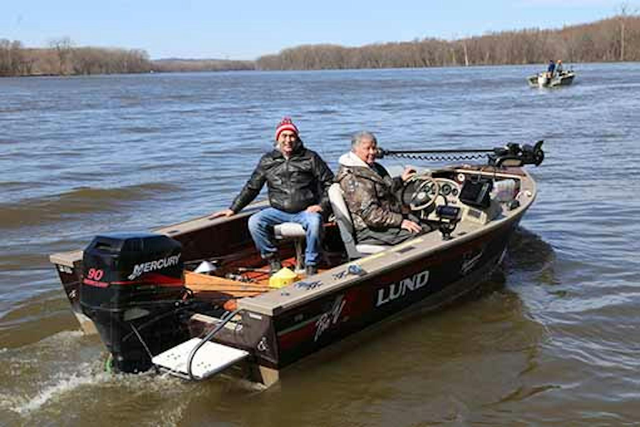 Fishing has been good for walleyes this spring on the Mississippi River near Red Wing, Minn. However, high water is building on the river due to melting snow in central and northern Minnesota, and together with recent rains will contribute to flooding by this weekend that is expected to slow fishing success. Here, Scott Kunz, left, of Albertville, Minn., and his brother, Tom, of Waverly, set out on Tuesday in front of Everts Resort in Hager City, Wis., across from Red Wing.