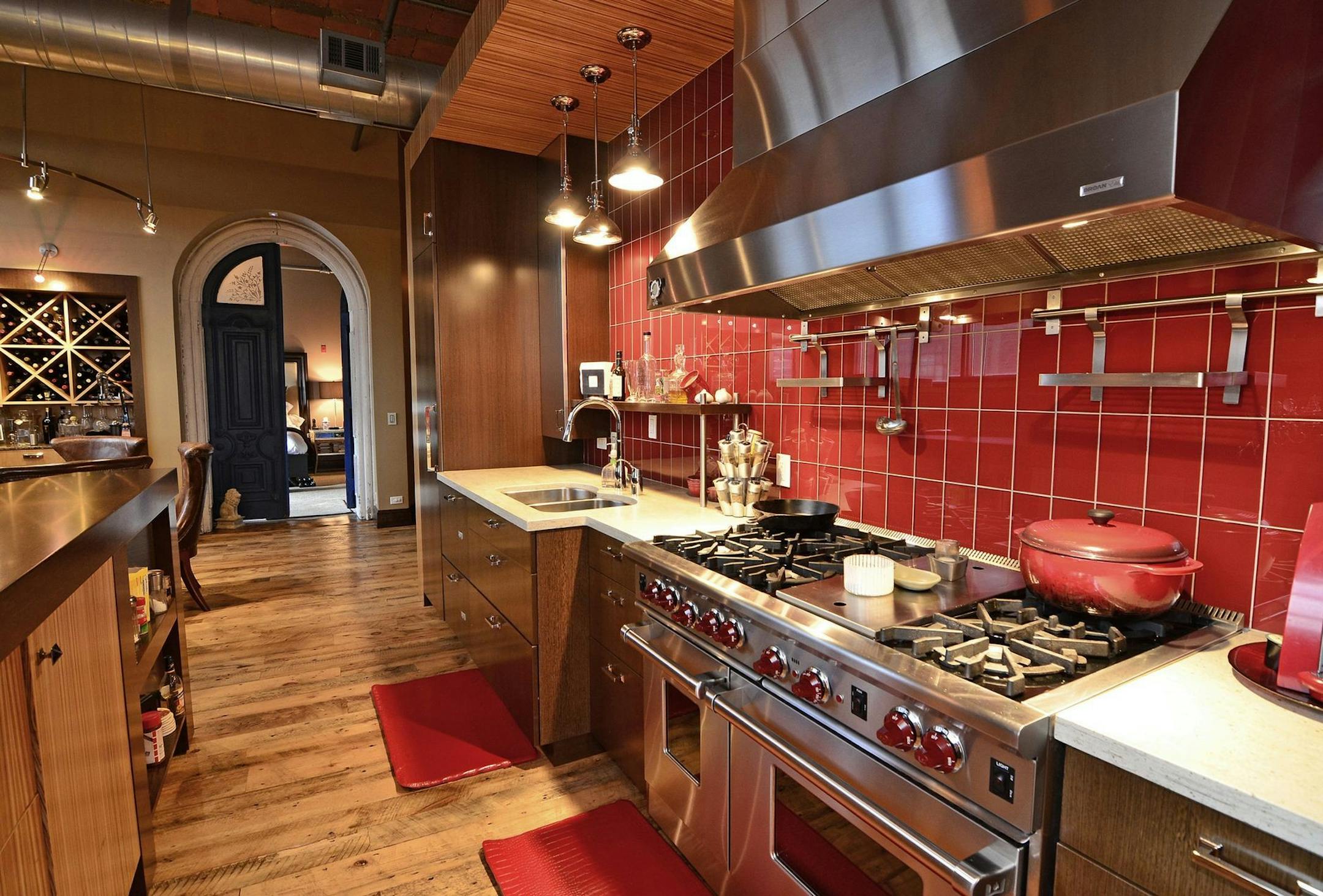 Kitchen looking toward master bedroom in loft condo at SoHo