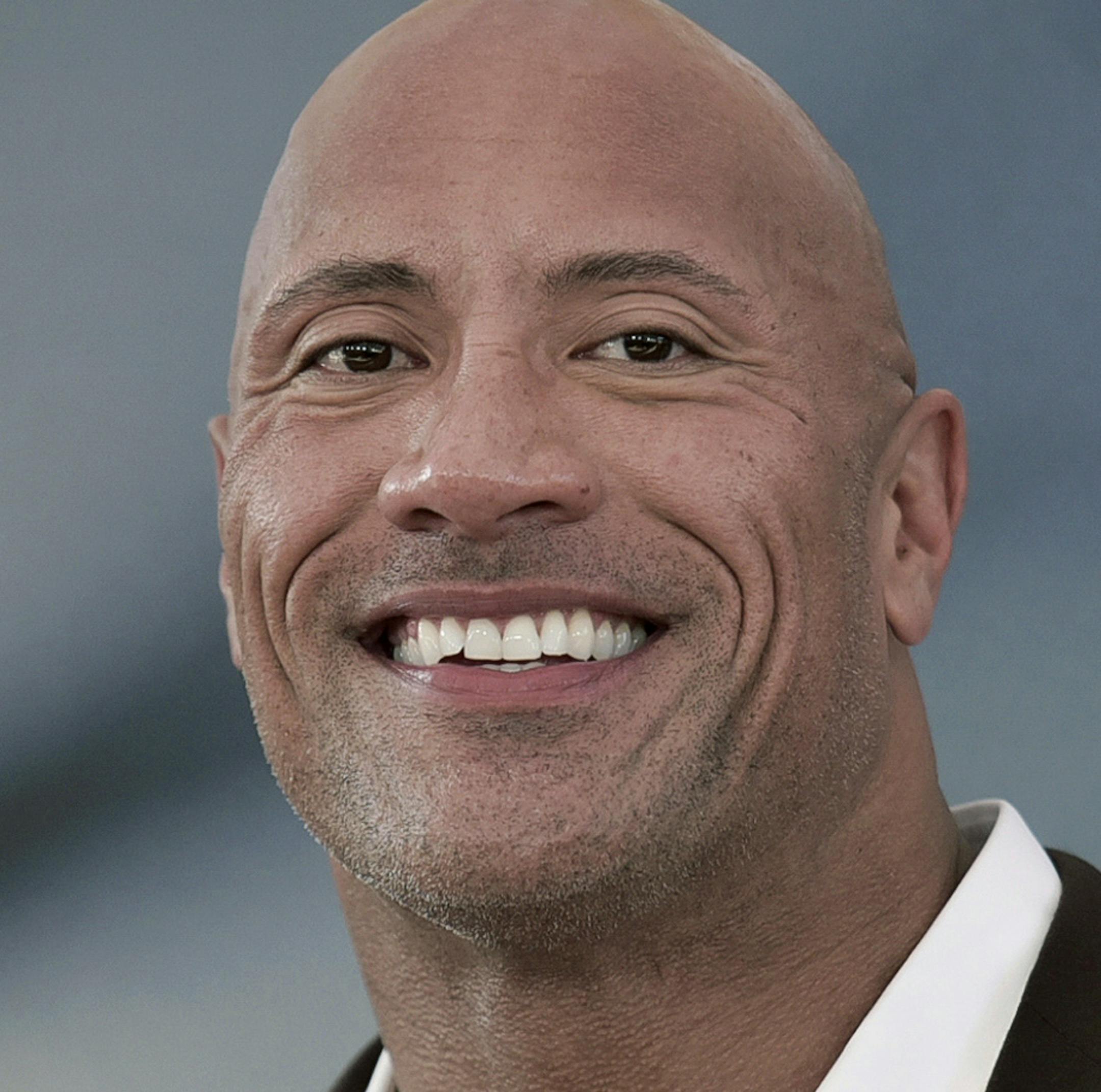 FILE - Dwayne Johnson attends the premiere of "Fast & Furious Presents: Hobbs & Shaw" on July 13, 2019, in Los Angeles. Johnson said he has acquired the XFL. The 48-year-old actor made the announcement on Twitter. Reportedly the price is $15 million. The XFL had eight franchises and played five games out of a planned 10-game schedule before canceling the remainder of its season in March because of the COVID-19 pandemic. (Photo by Richard Shotwell/Invision/AP, File)