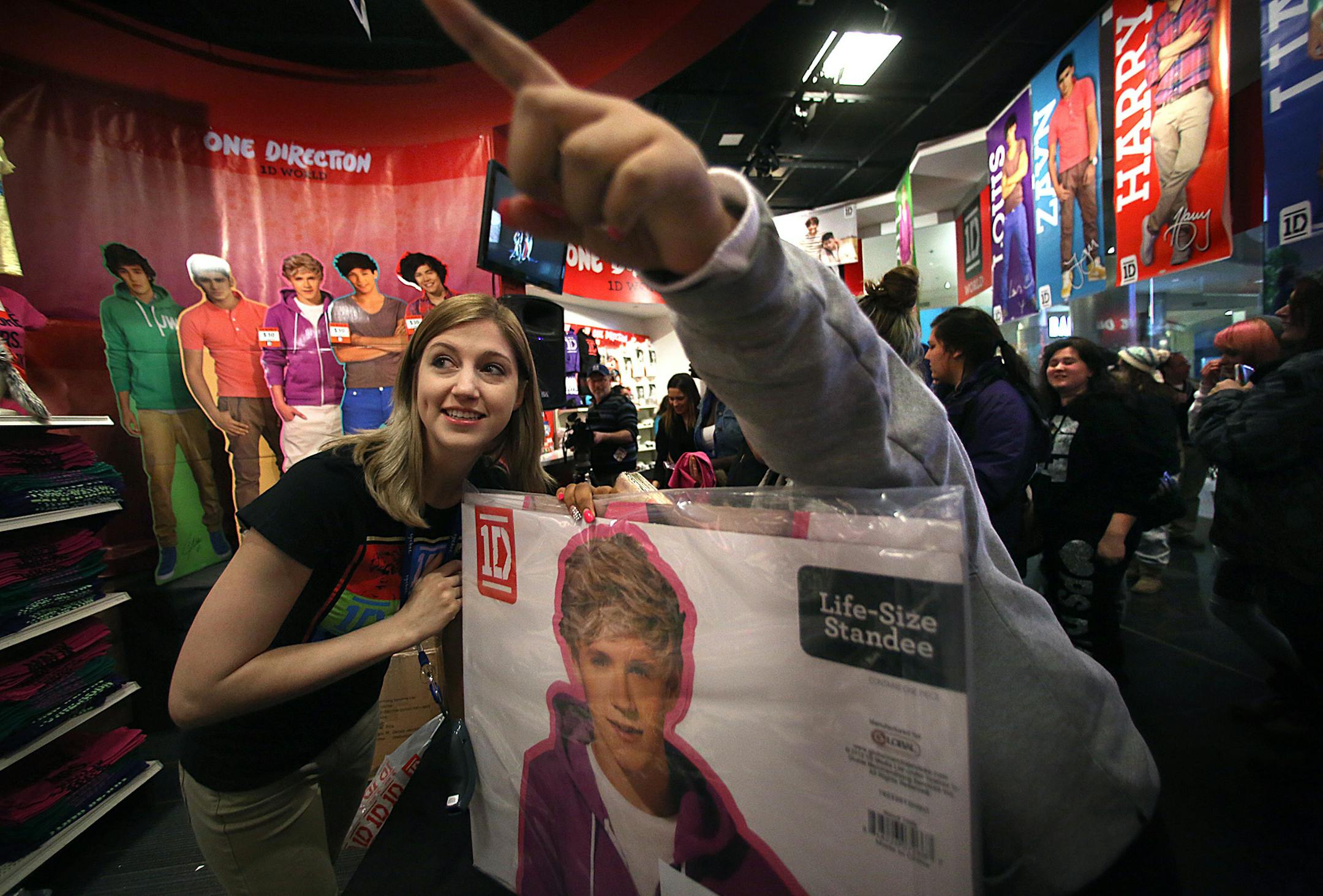 Sales associate Nicole Piechowski helped customers find what they were looking for. ] JIM GEHRZ&#x201a;&#xc4;&#xa2;jgehrz@startribune.com (JIM GEHRZ/STAR TRIBUNE) / March 16, 2013 / 8:30 AM Bloomington, MN &#x201a;&#xc4;&#xec; BACKGROUND INFORMATION: Several hundred young fans of the band One Direction turned out at the Mall of America for the grand opening of a new store that will be selling all things One Direction. The &#x201a;&#xc4;&#xfa;pop-up&#x201a;&#xc4;&#xf9; store will be open for six