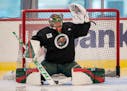 Former Gophers goalie Mat Robson made a save during the Wild's development camp on Tuesday.