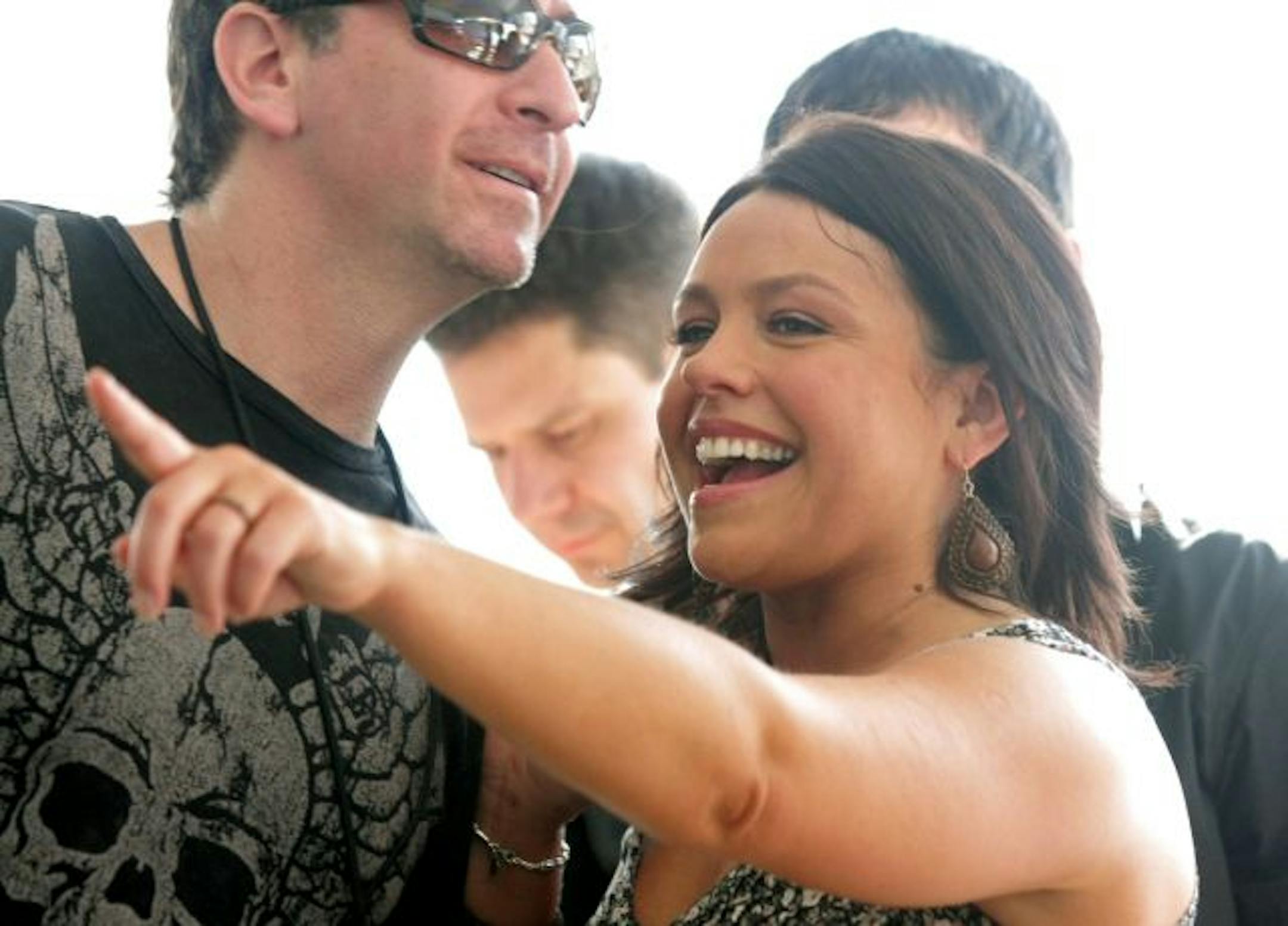 Rachael Ray listens to The Hold Steady perform during a party she hosted at the SXSW Music Festival in Austin, Texas on Saturday, March 21, 2009.