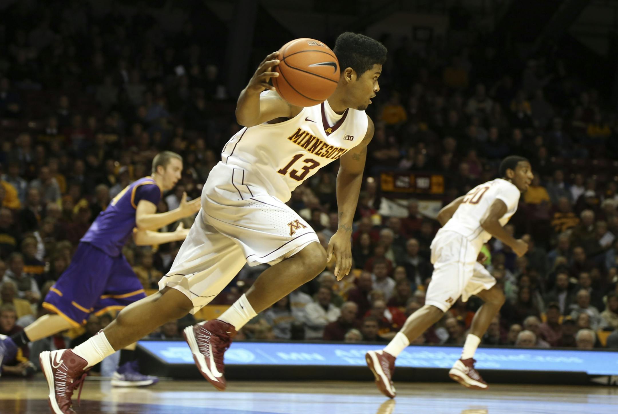 Long hours of extra practice with roommate/teammate Austin Hollins have helped Gophers reserve guard Maverick Ahanmisi (13) become a more complete player. He's shooting 52 percent from the field — up almost 23 percent from last year — and 43.8 percent from three-point range.