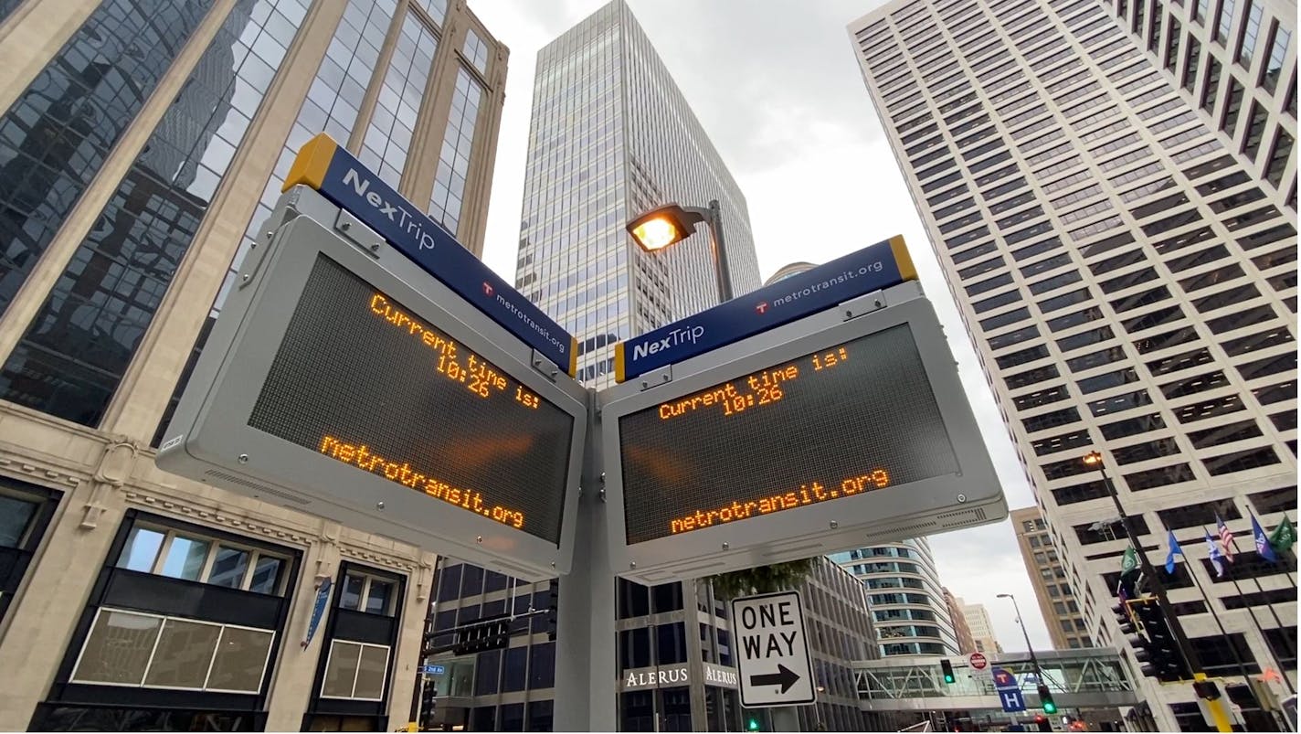 New digital signs such as this one at 6th Street and 2nd Avenue S. in downtown Minneapolis, are expected to give riders to bus information that has a higher degree of accuracy than the old signs Metro Transit took down.