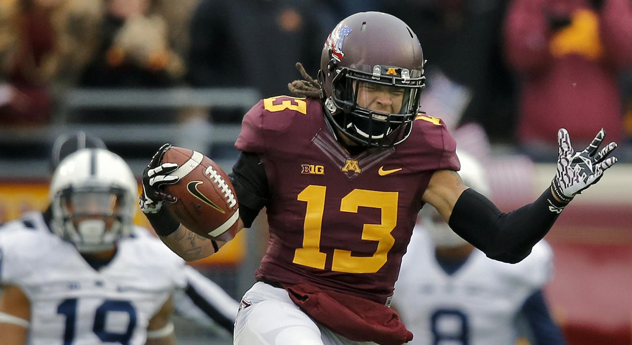 Minnesota Gophers vs. Penn State. Minnesota won 24-10. Defensive back Derrick Wells celebrated with the ball after breaking up a Penn State pass to Richy Anderson (19) in the end zone late in the game. (MARLIN LEVISON/STARTRIBUNE(mlevison@startribune.com)